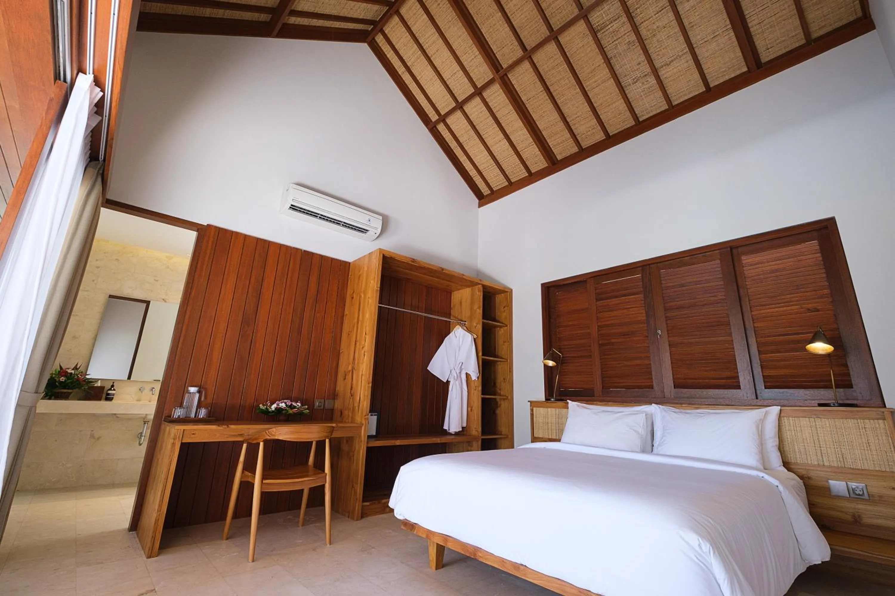 Bed in Amarta Beach Retreat by Nakula