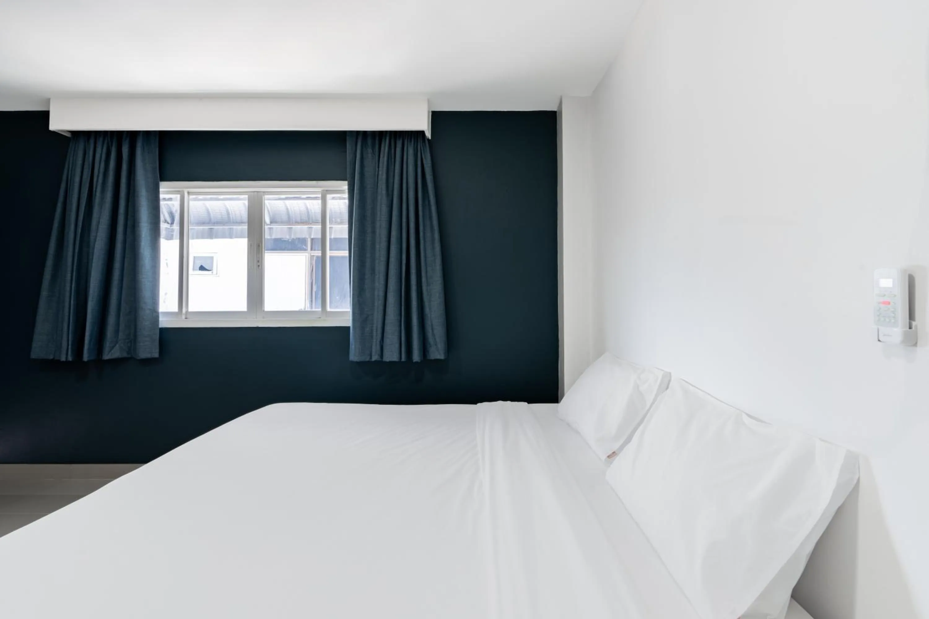 Bed in Terminal2 Hotel Phukettown