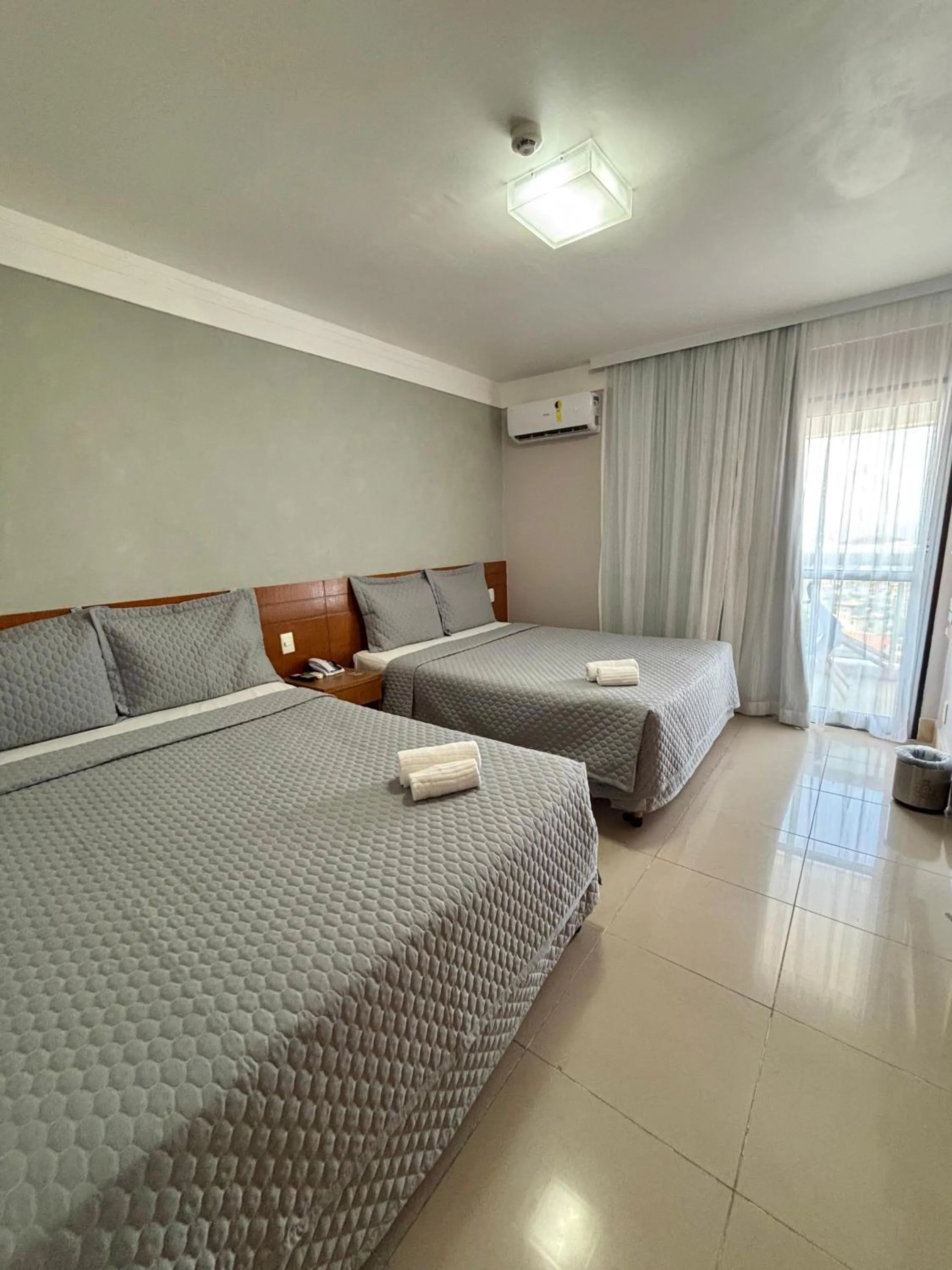 Bed in Royal Urban Macaé Hotel