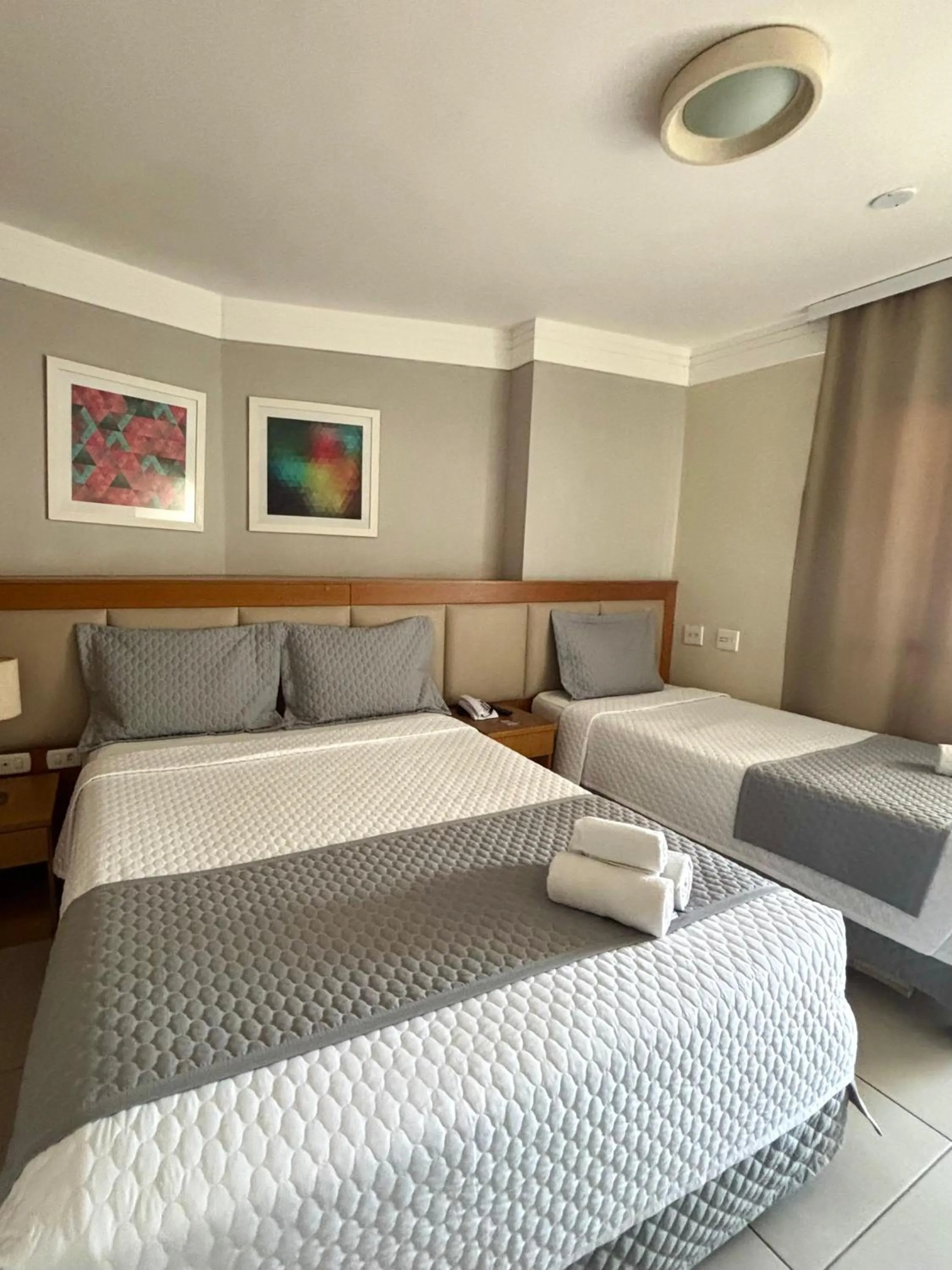 Bed in Royal Urban Macaé Hotel