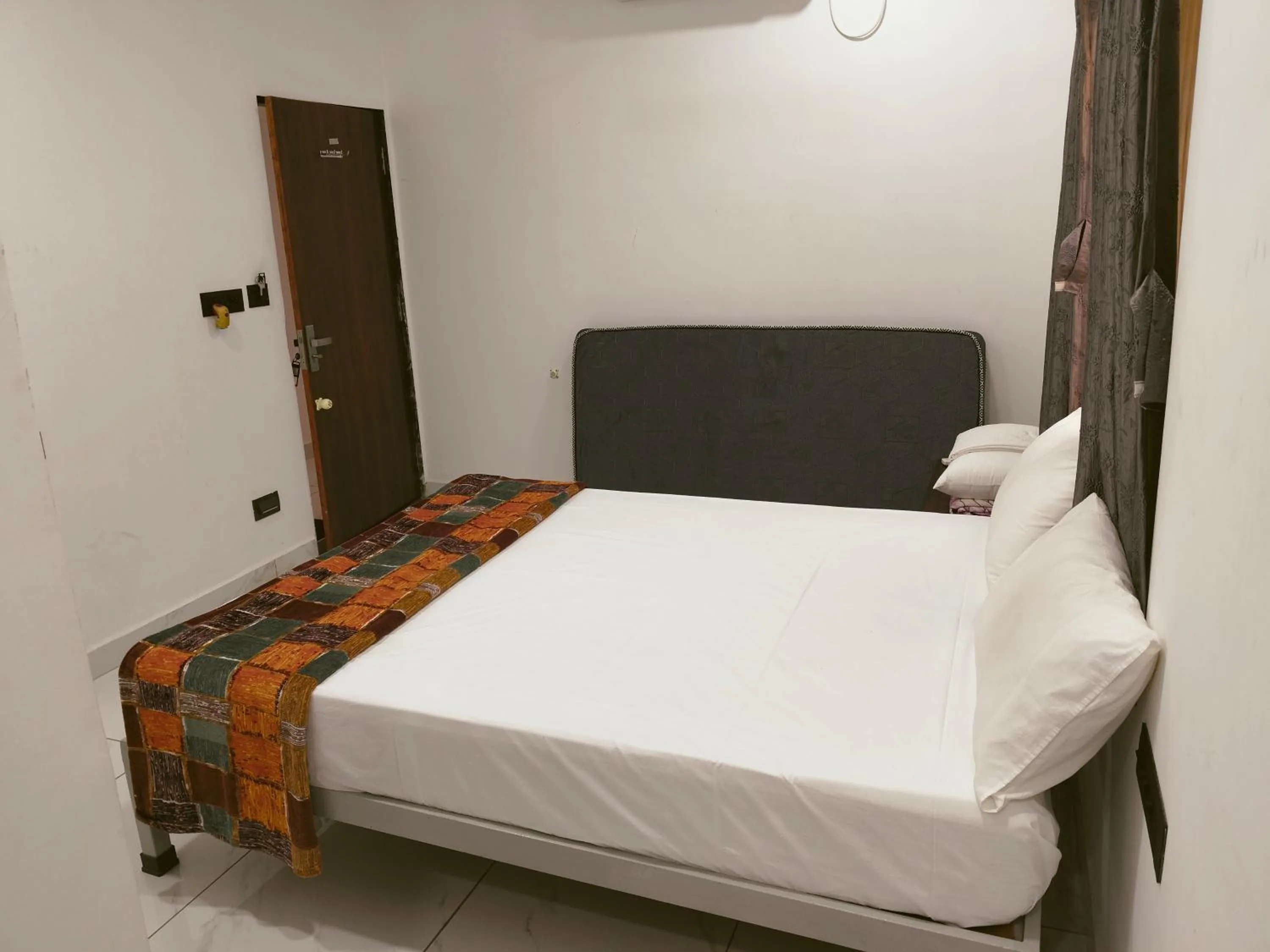 Bed in Gurukrupa Yatri Niwas