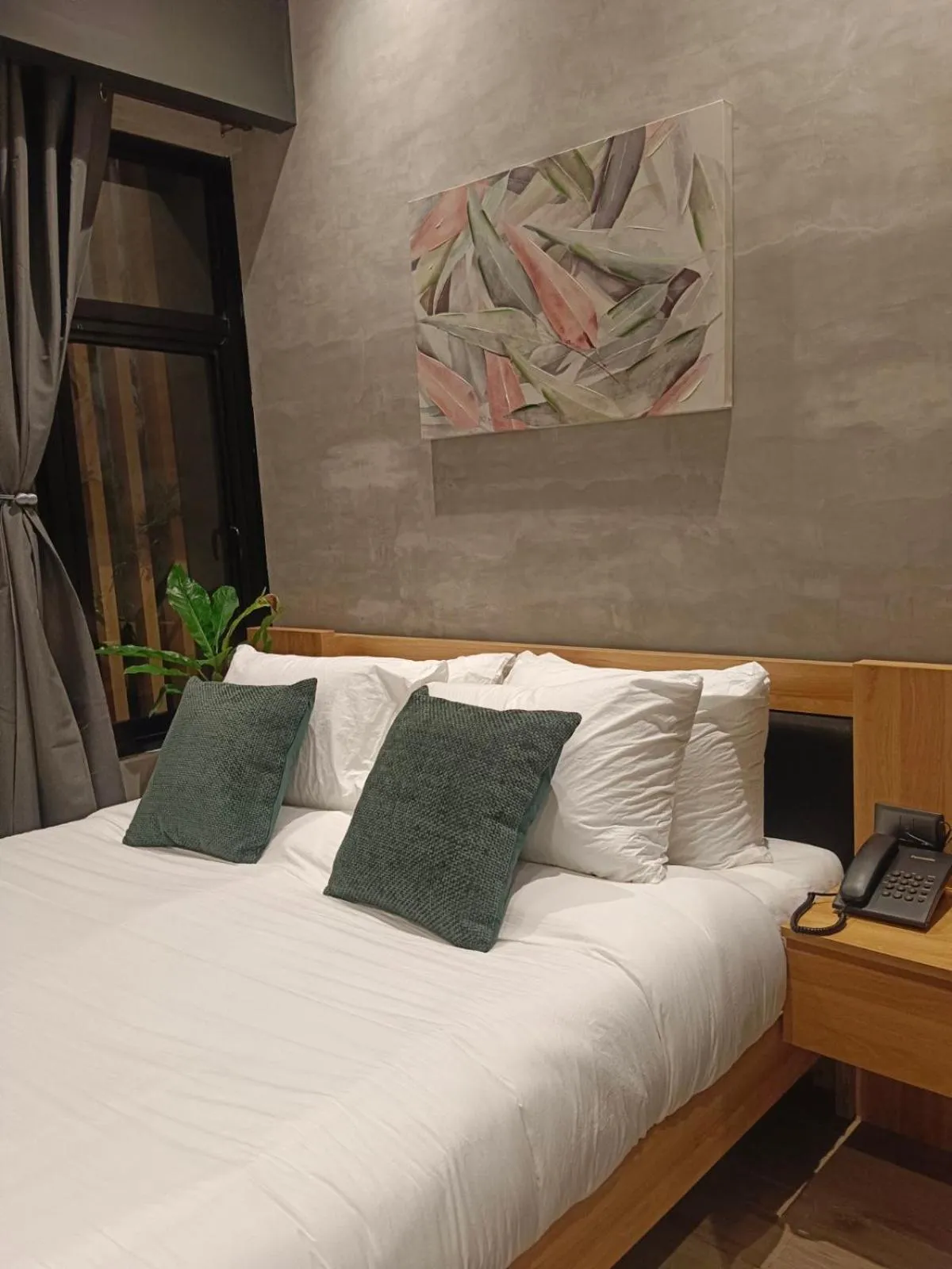 Bed in Caldwell Boutique Hotel