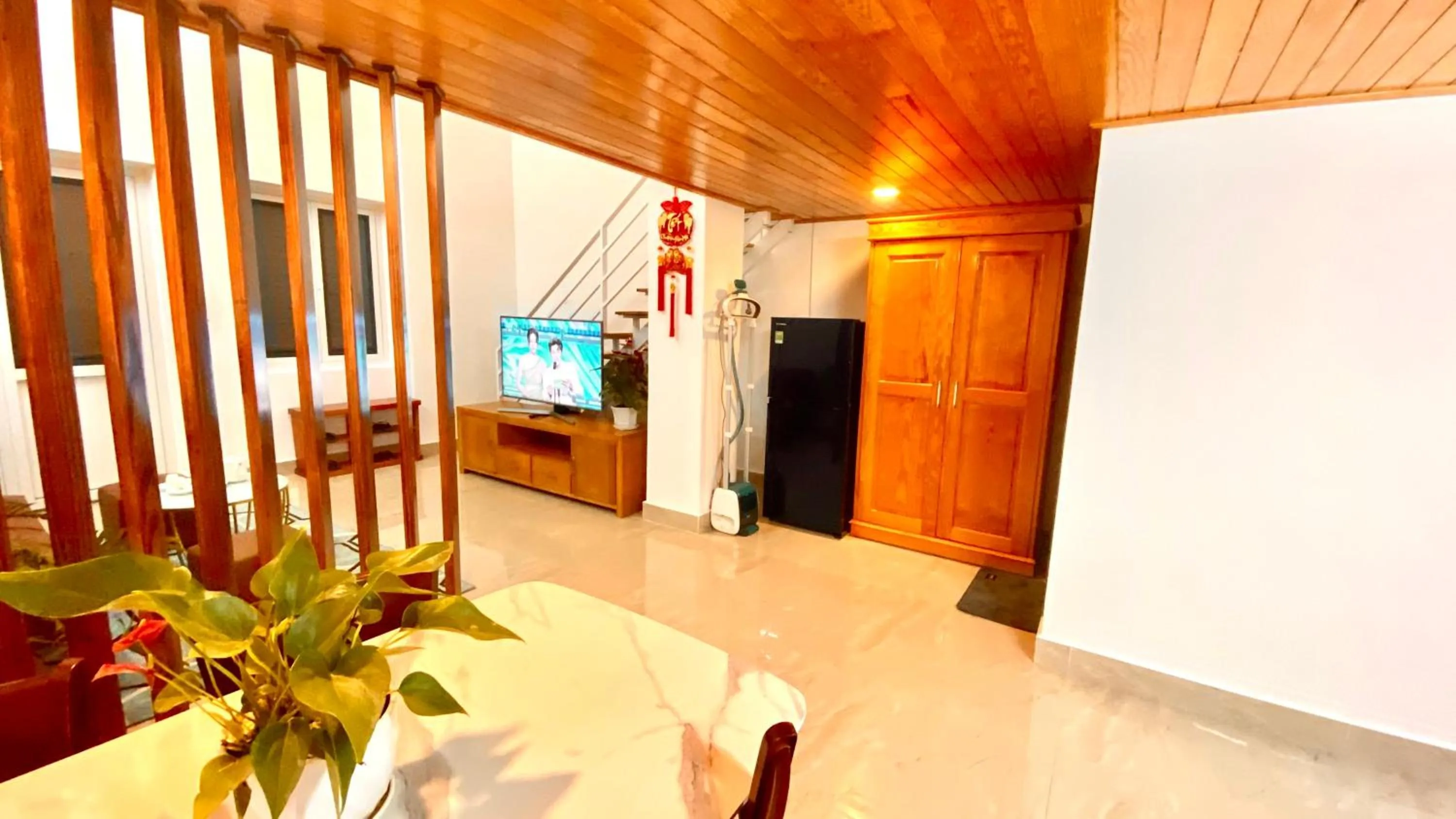 Communal lounge/ TV room in Lê Mùi Hotel - Apartment