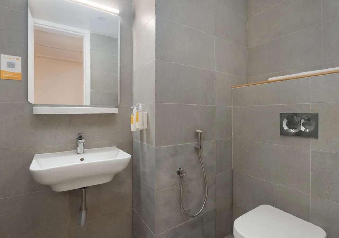 Bathroom in Bloom Hotel - DLF Road Gachibowli