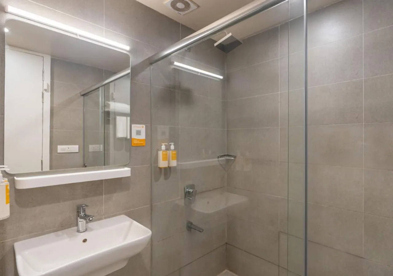 Bathroom in Bloom Hotel - DLF Road Gachibowli