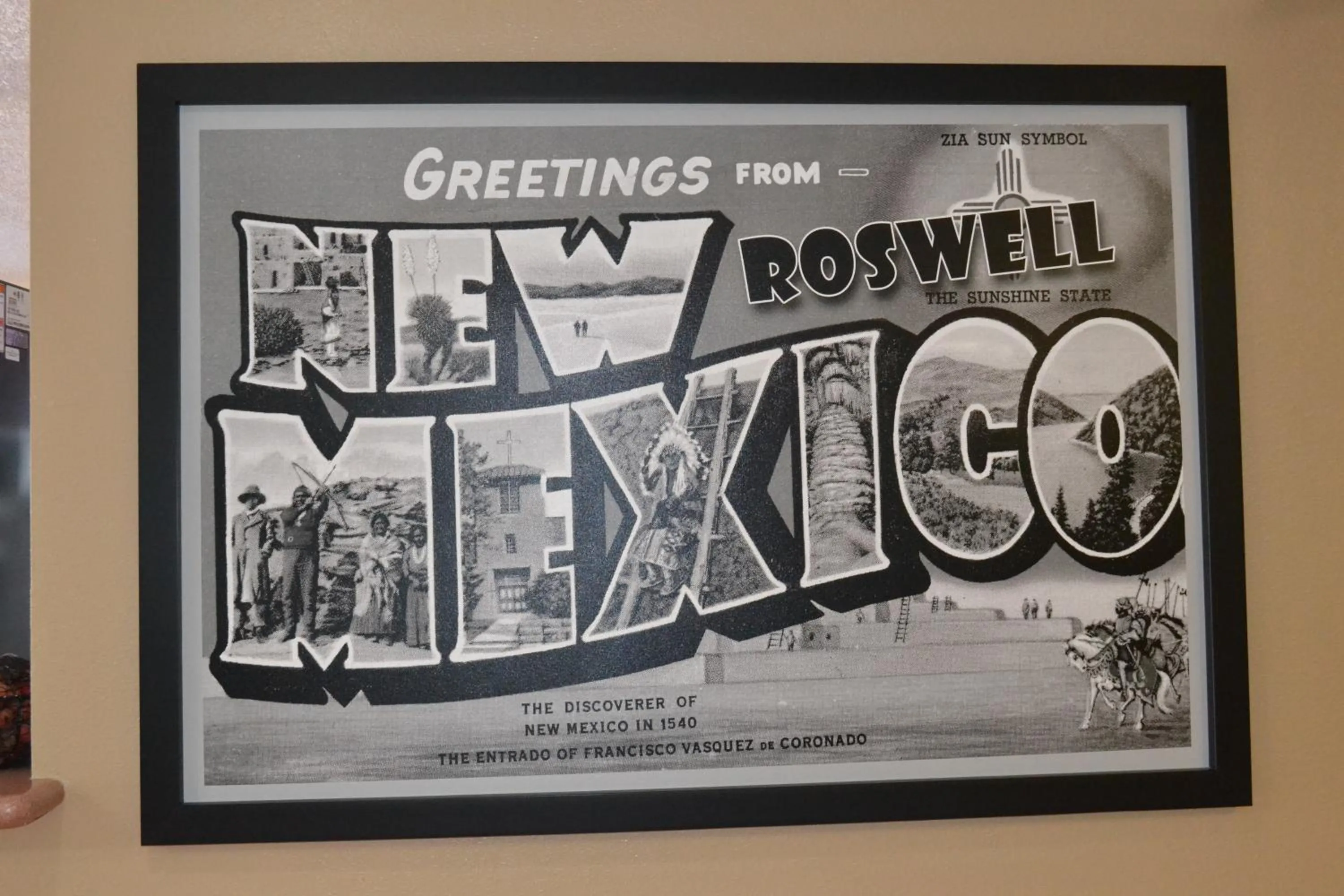 Property logo or sign in Super 8 by Wyndham Roswell