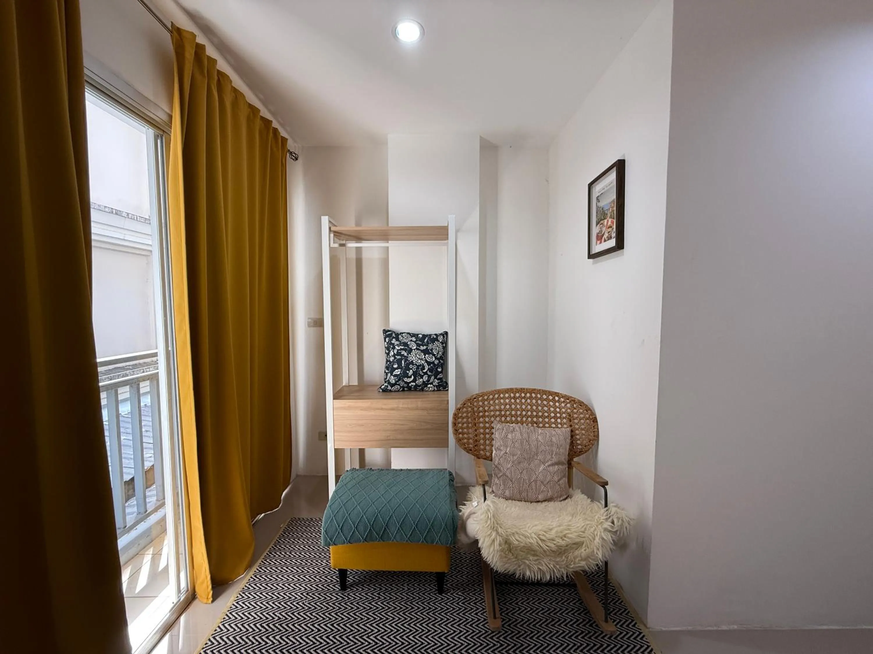 Seating area in Five Loaves Beds Patong