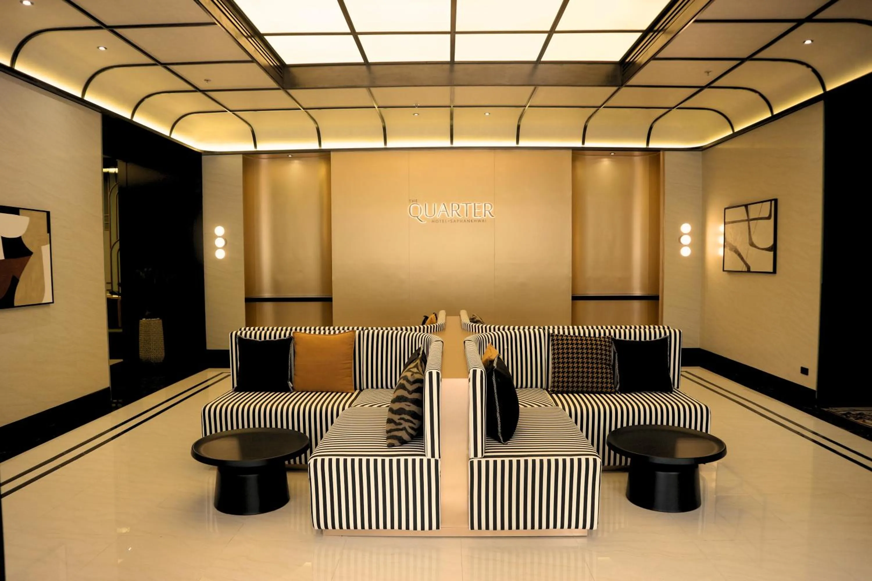 Lobby or reception in The Quarter Saphankhwai by UHG