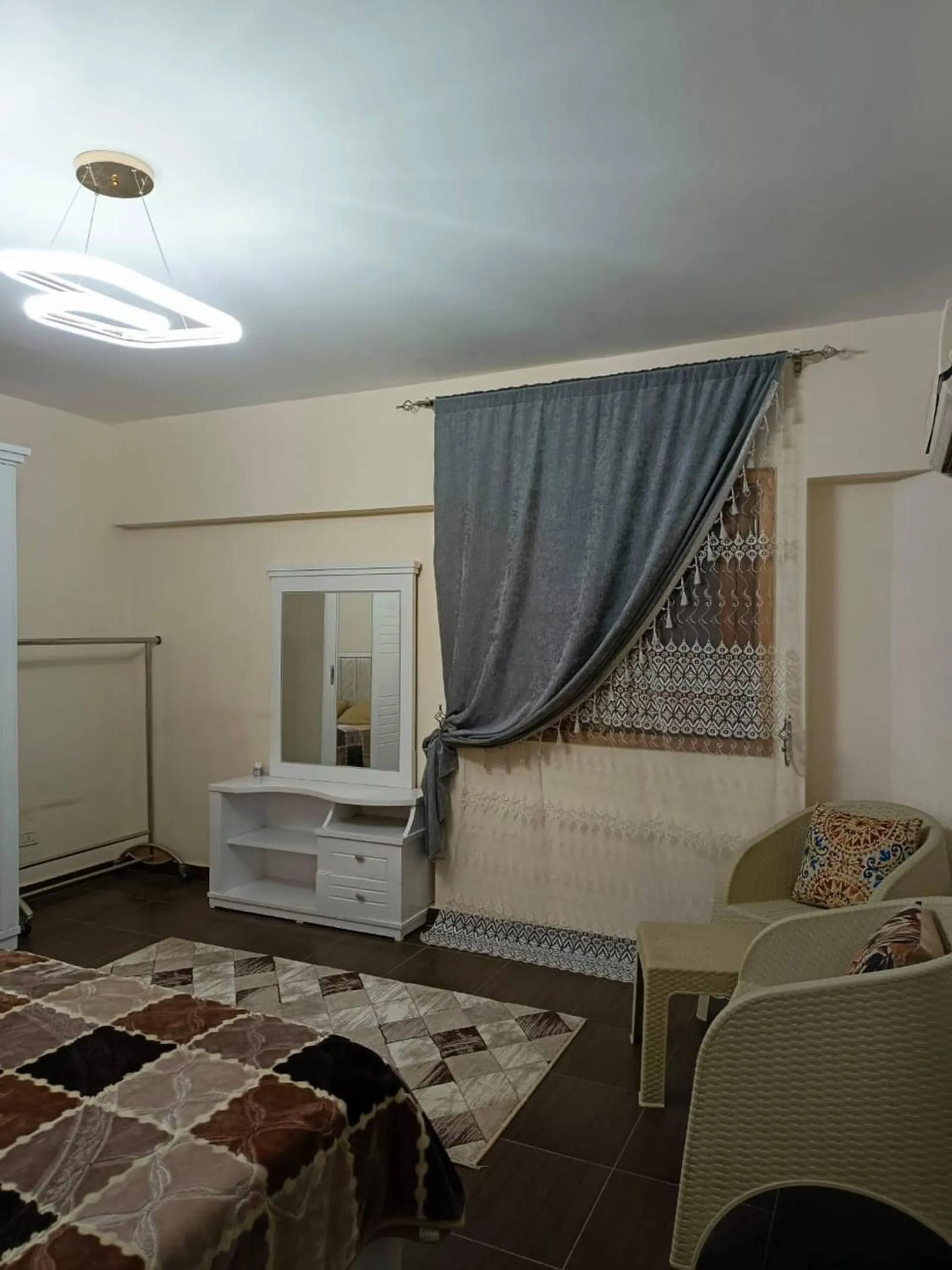 Seating area, Bed in Enjoying And Comfortable Stay