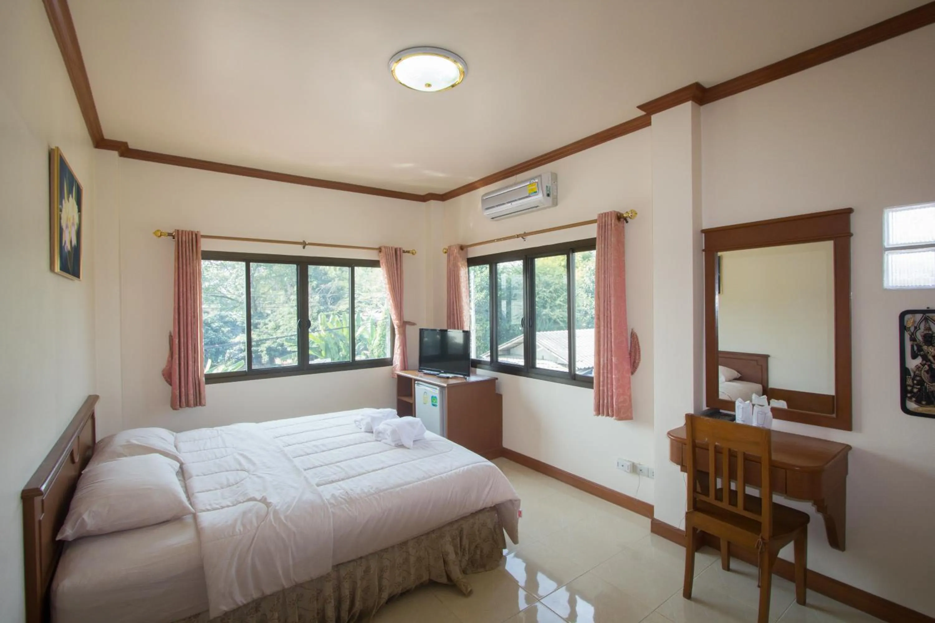 Bed in Donchai House Guest House& Cafe