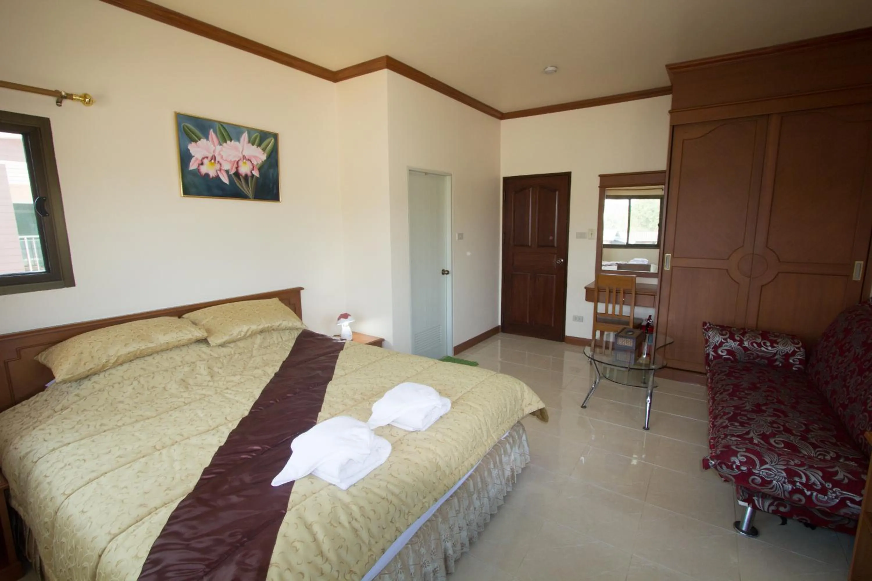 Bed in Donchai House Guest House& Cafe