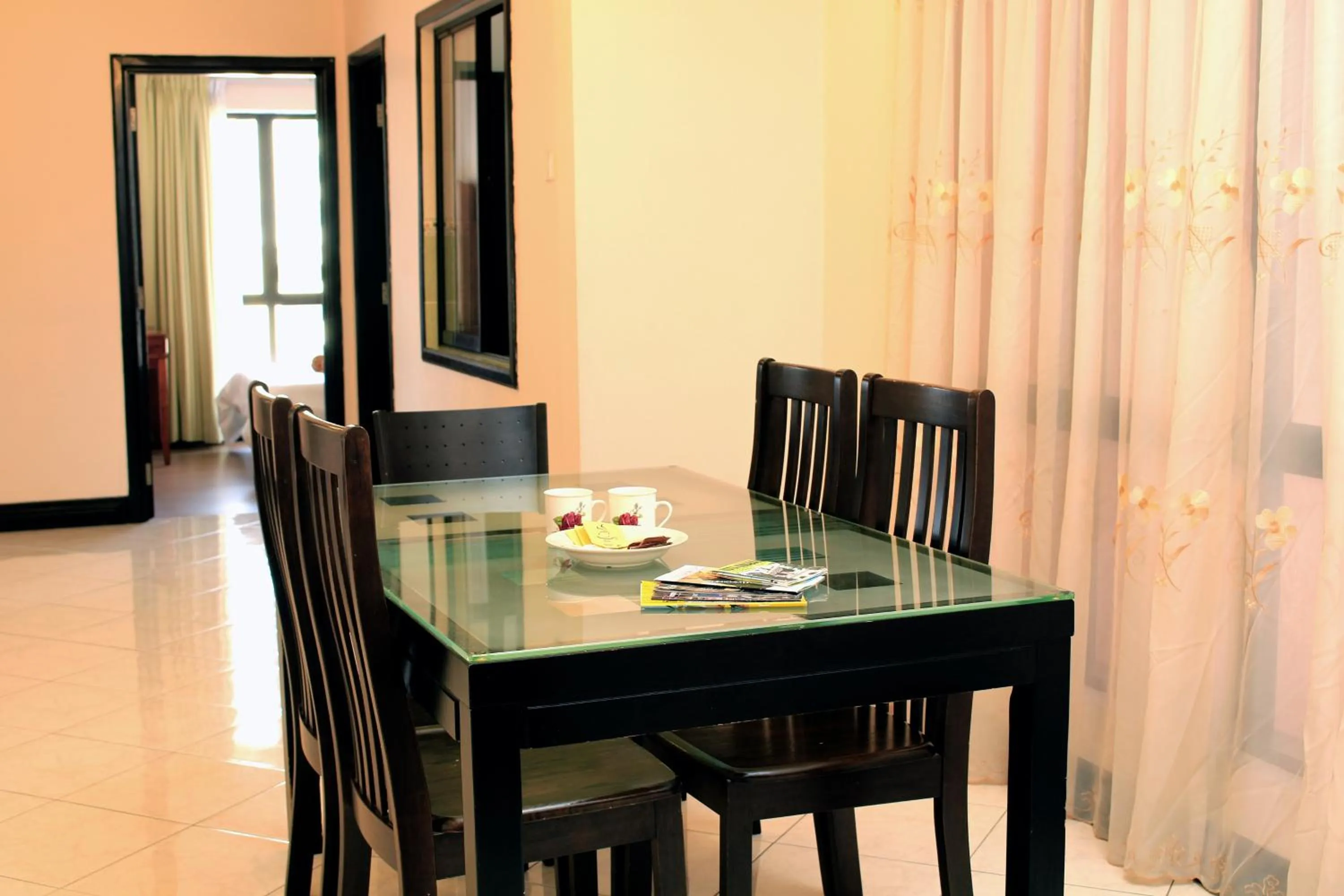 Dining area in KK Vacation Apartments-Marina Court - STAY AND GET CASH REBATE