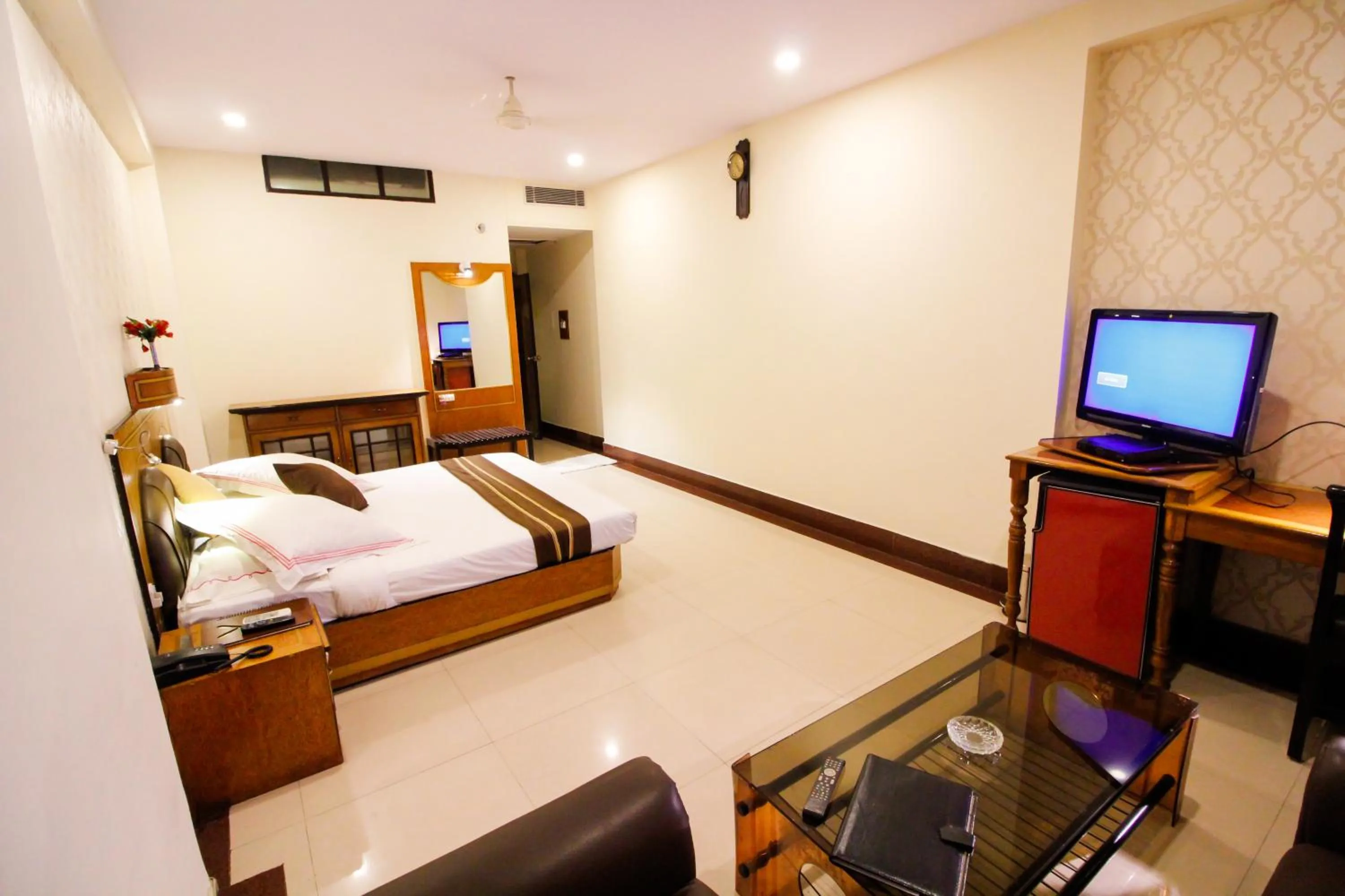 Bed in Hotel Rishi Regency
