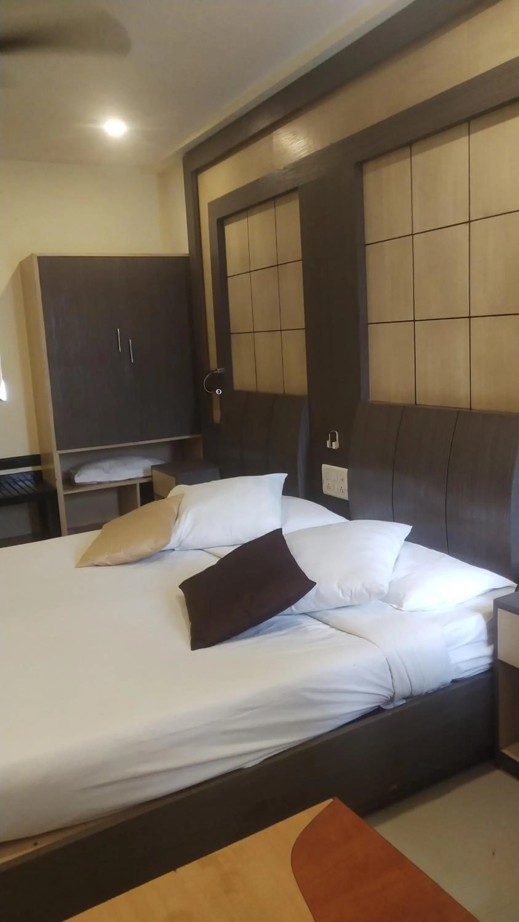 Bed in Hotel Rishi Regency