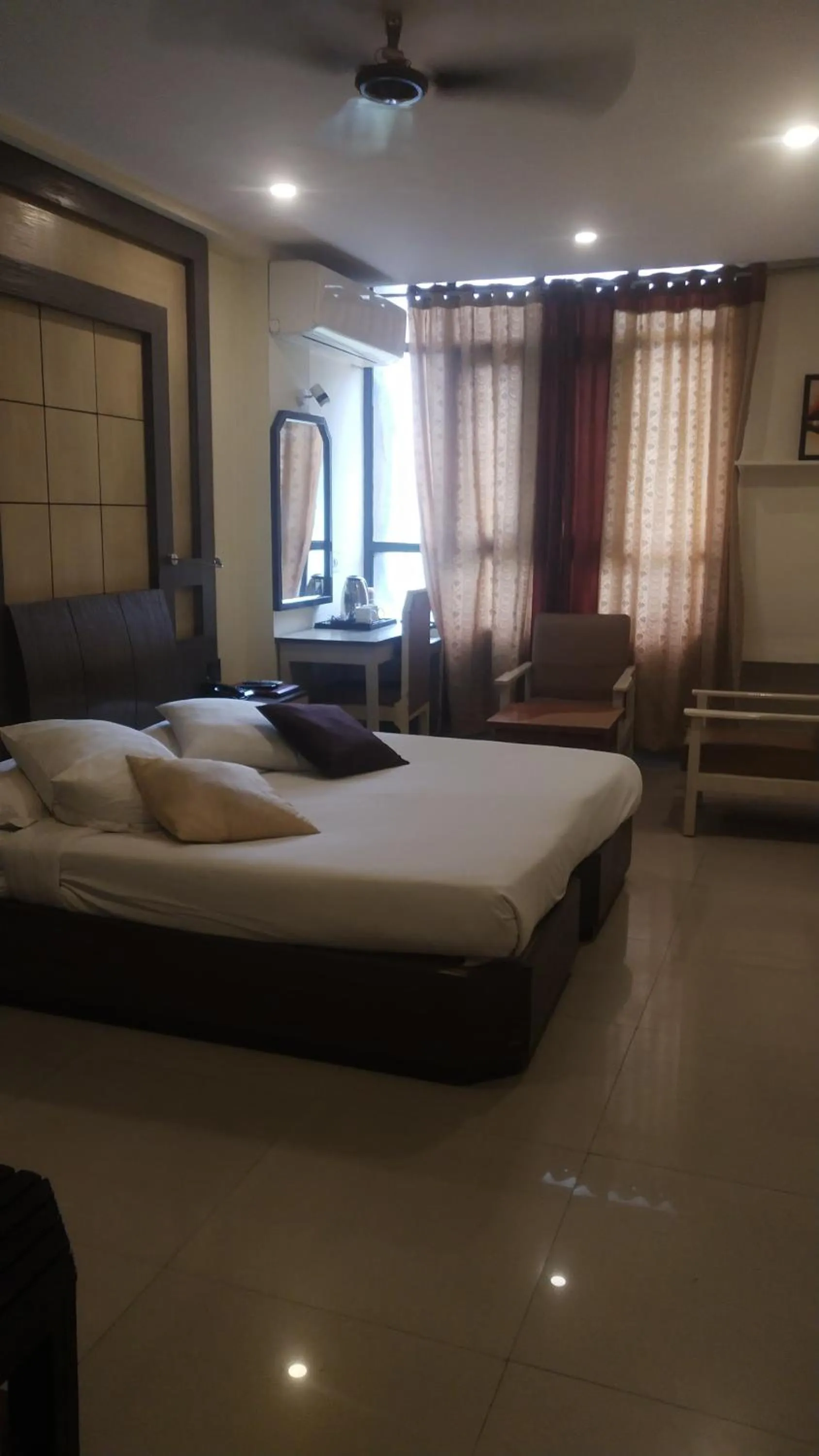 Bed in Hotel Rishi Regency