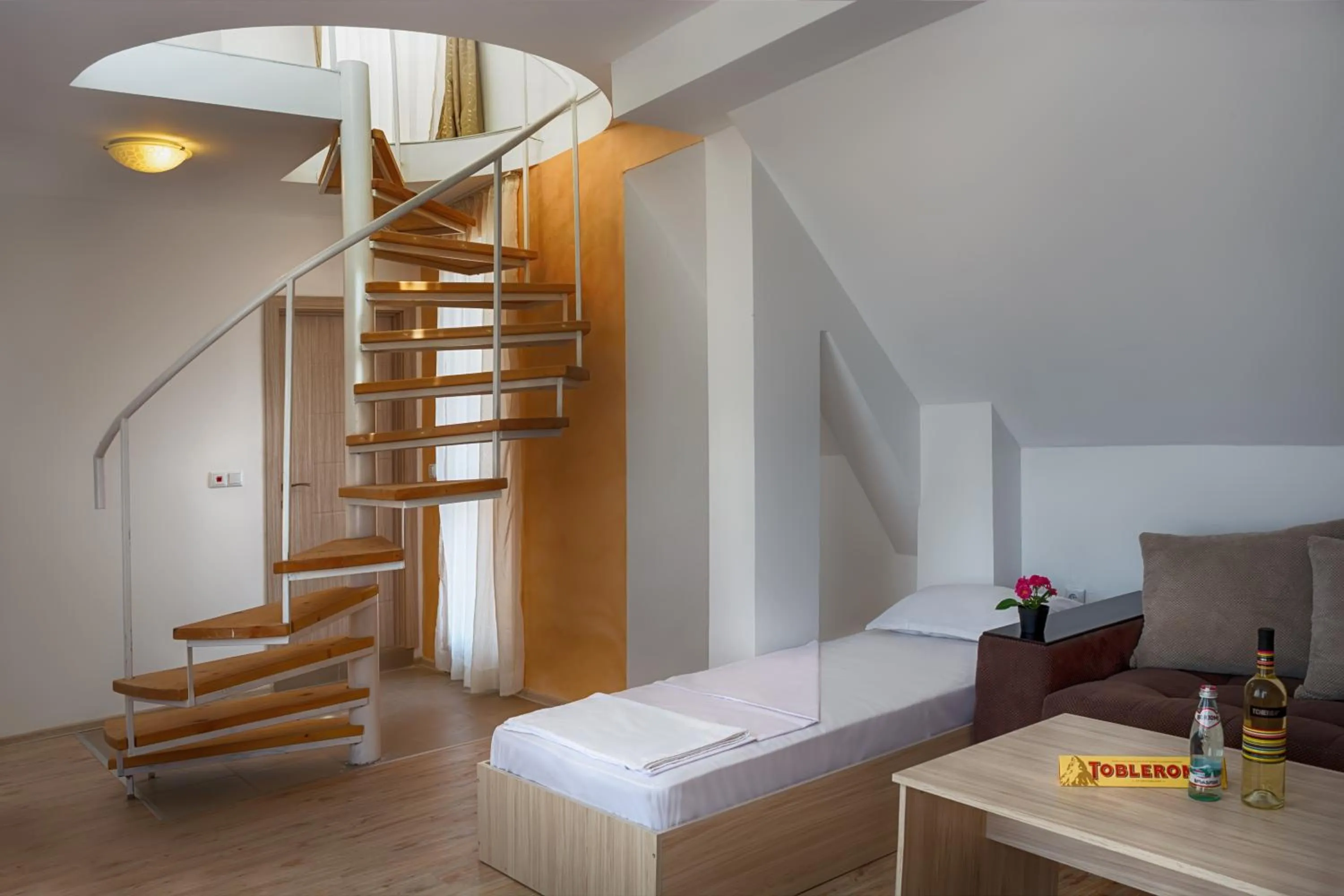 Bed in Vanilla Garden Apartments