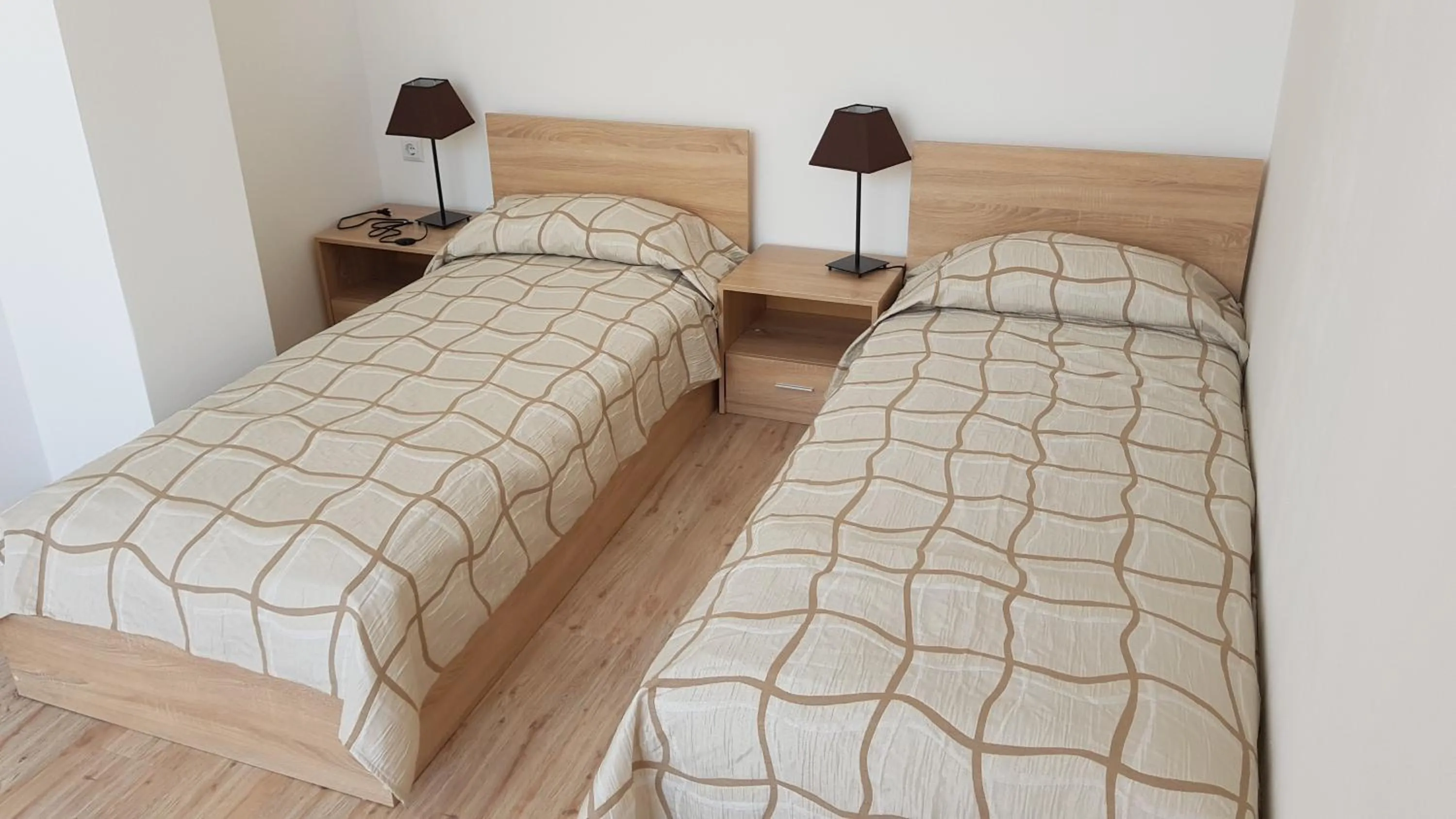 Bed in Vanilla Garden Apartments