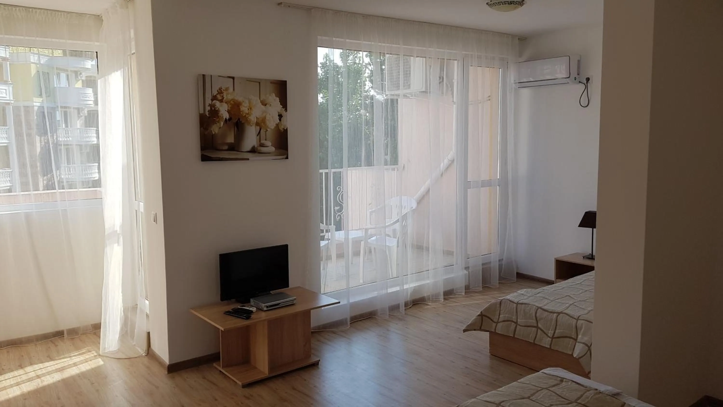 Bed in Vanilla Garden Apartments