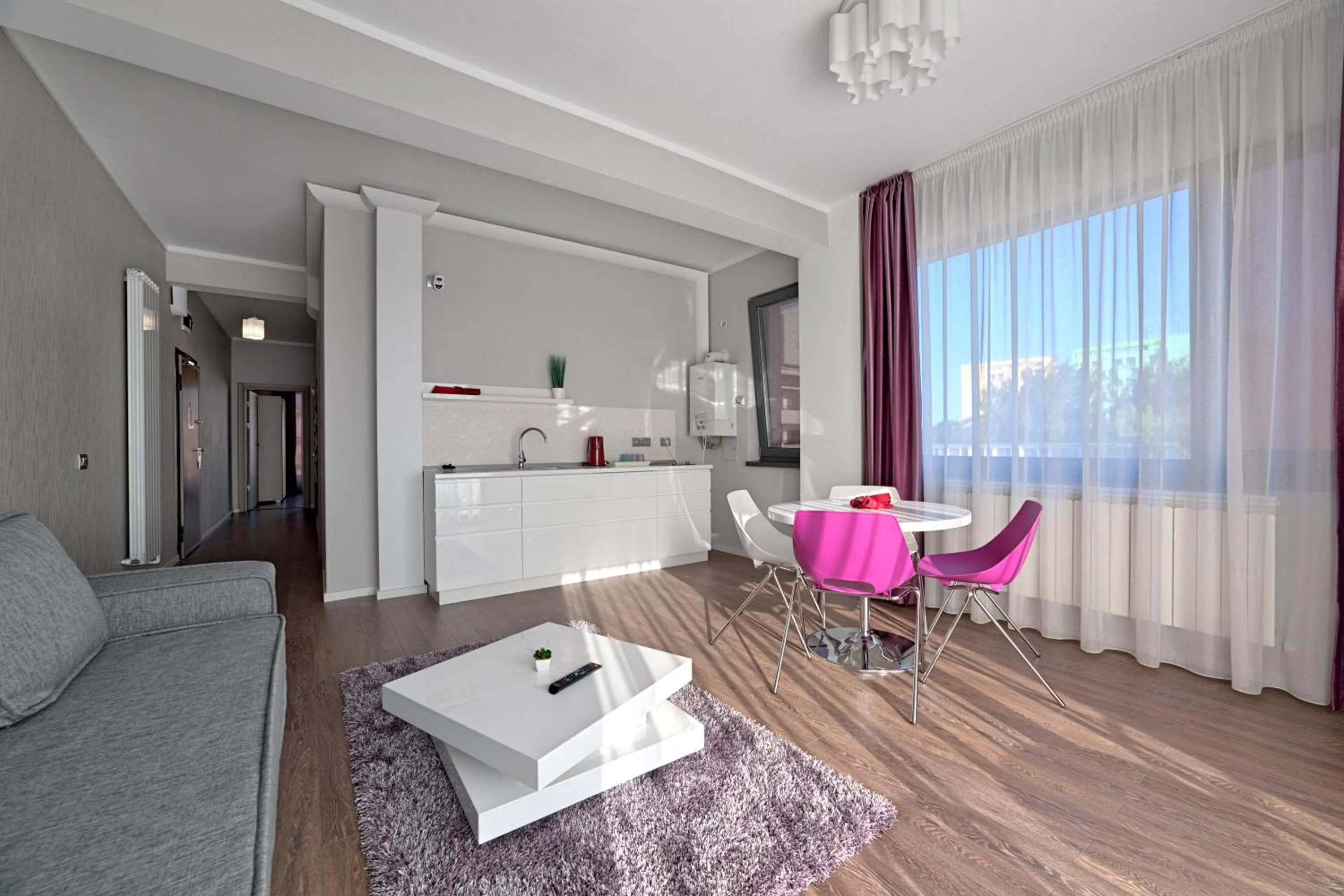 Photo of the whole room in Tomis Garden Apartments Mamaia
