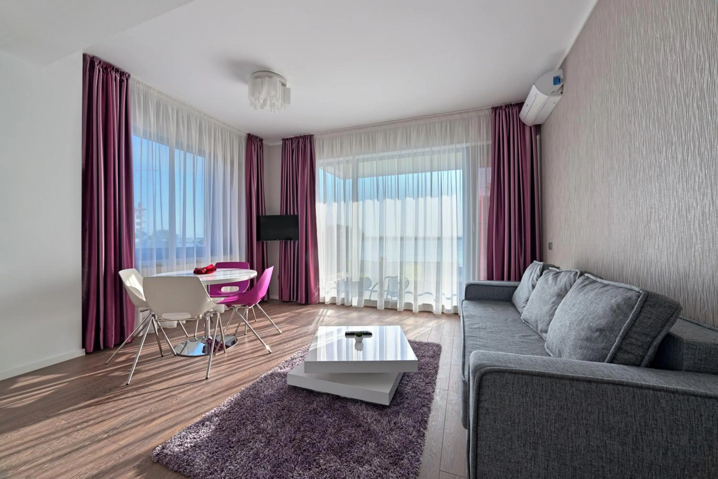 Photo of the whole room in Tomis Garden Apartments Mamaia
