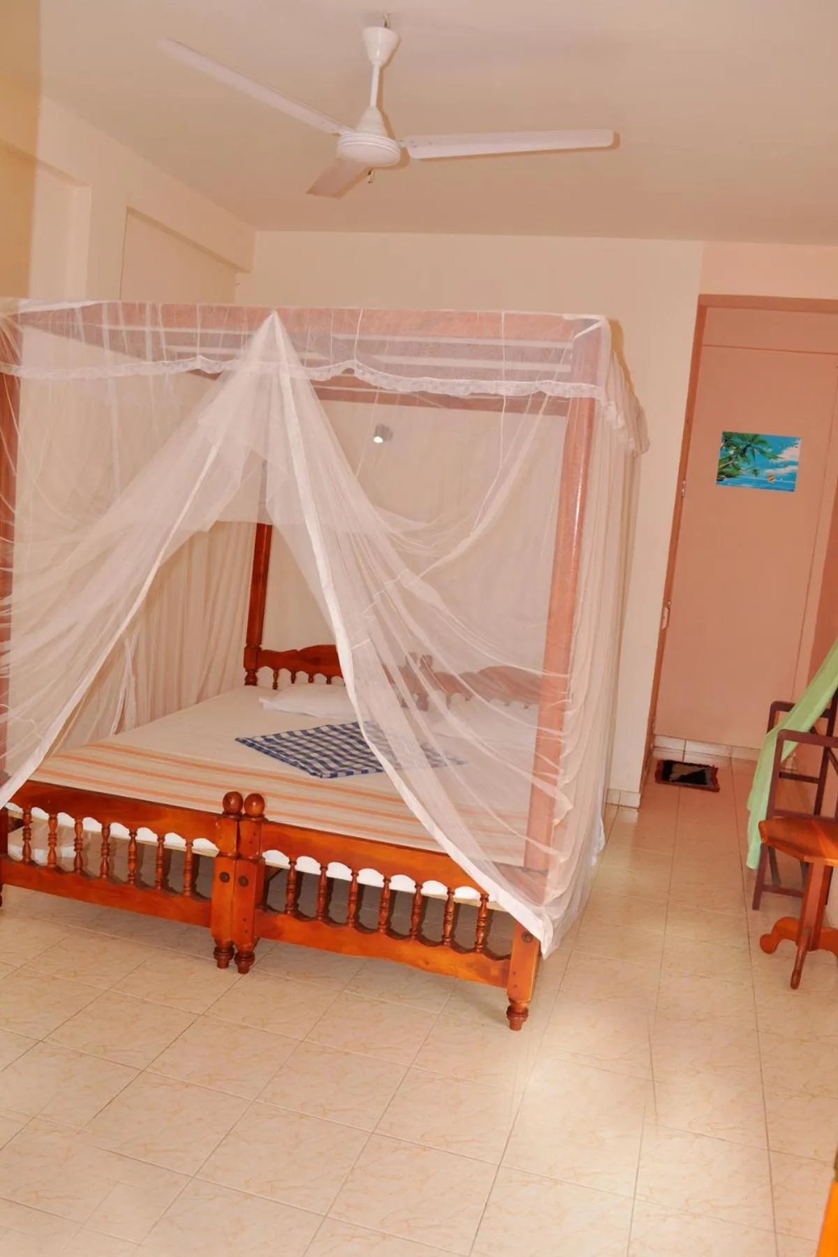 Photo of the whole room, Bed in Dilena Beach Inn