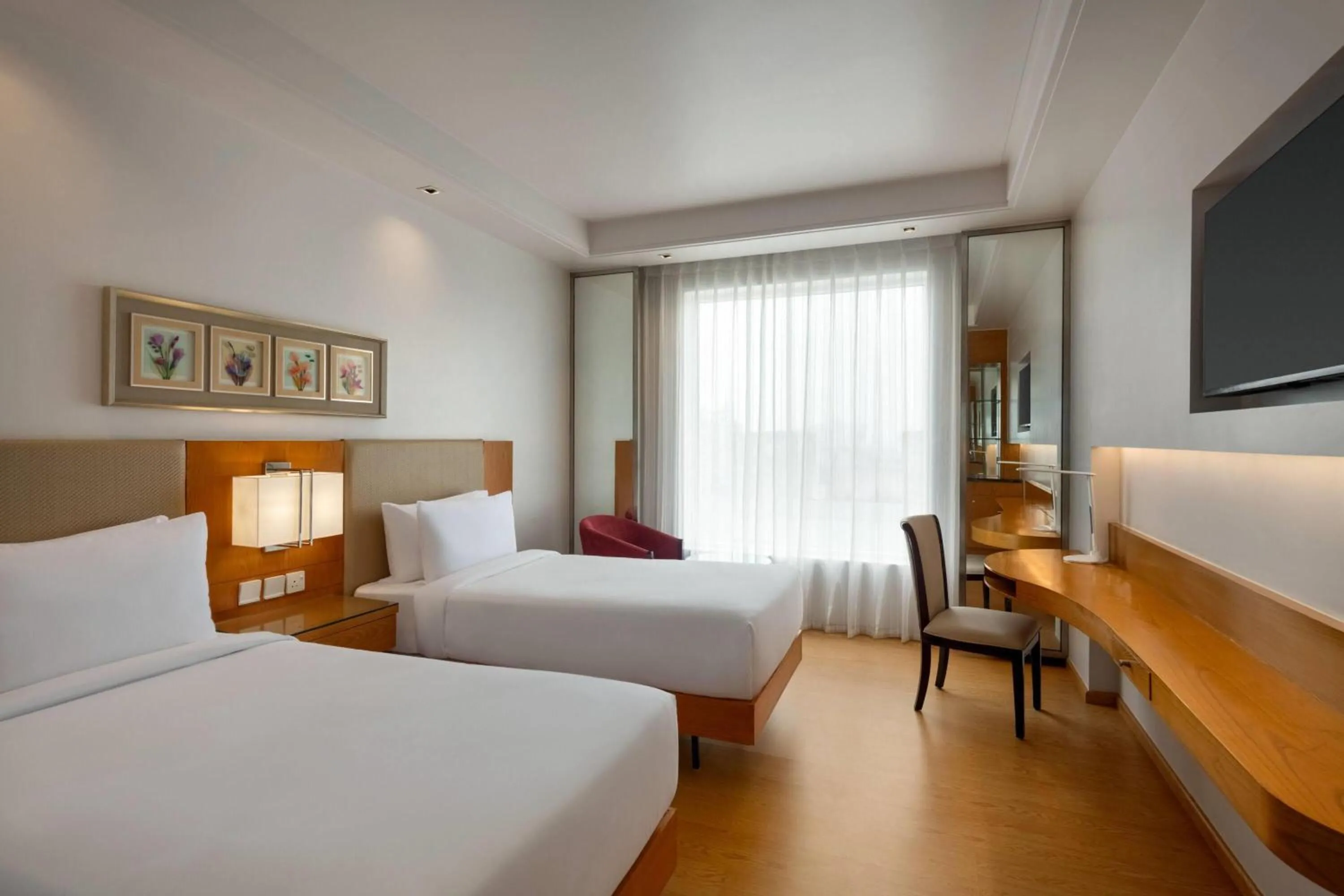 Photo of the whole room, Bed in Ramada by Wyndham Ghaziabad Vasundhara