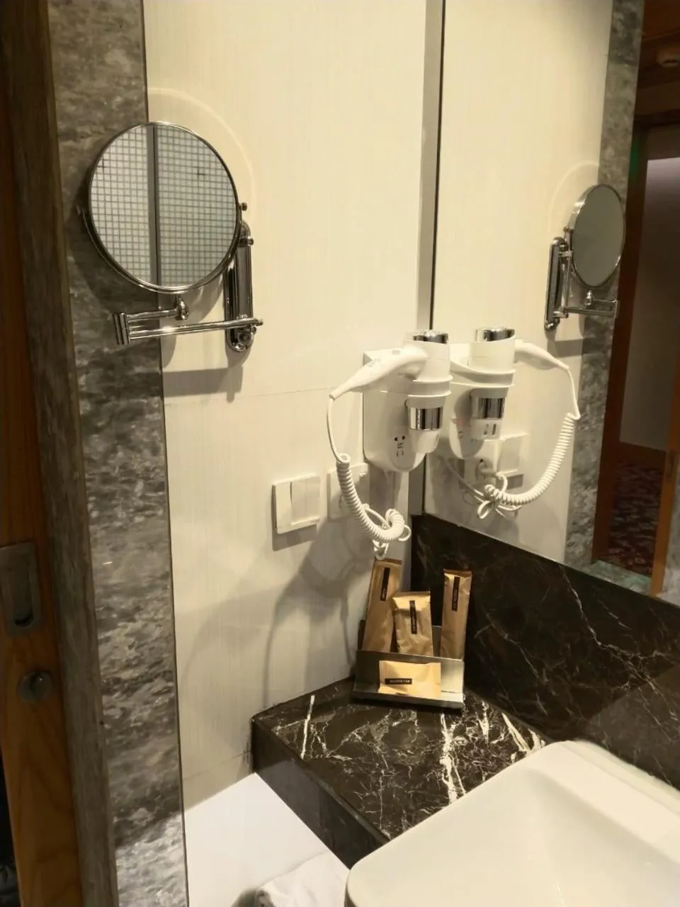 Bathroom in Ramada by Wyndham Ghaziabad Vasundhara