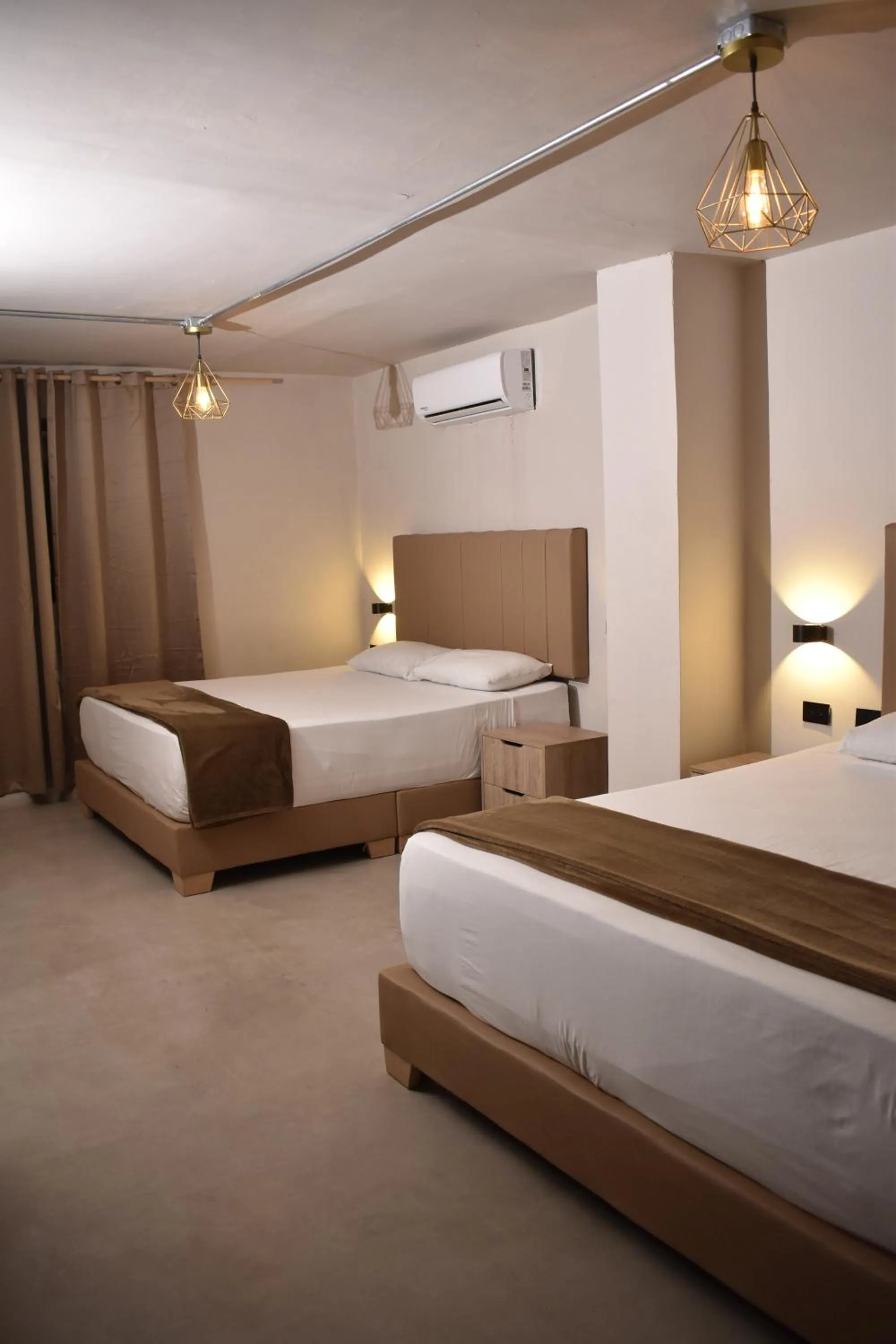 Photo of the whole room, Bed in History Center Hotel