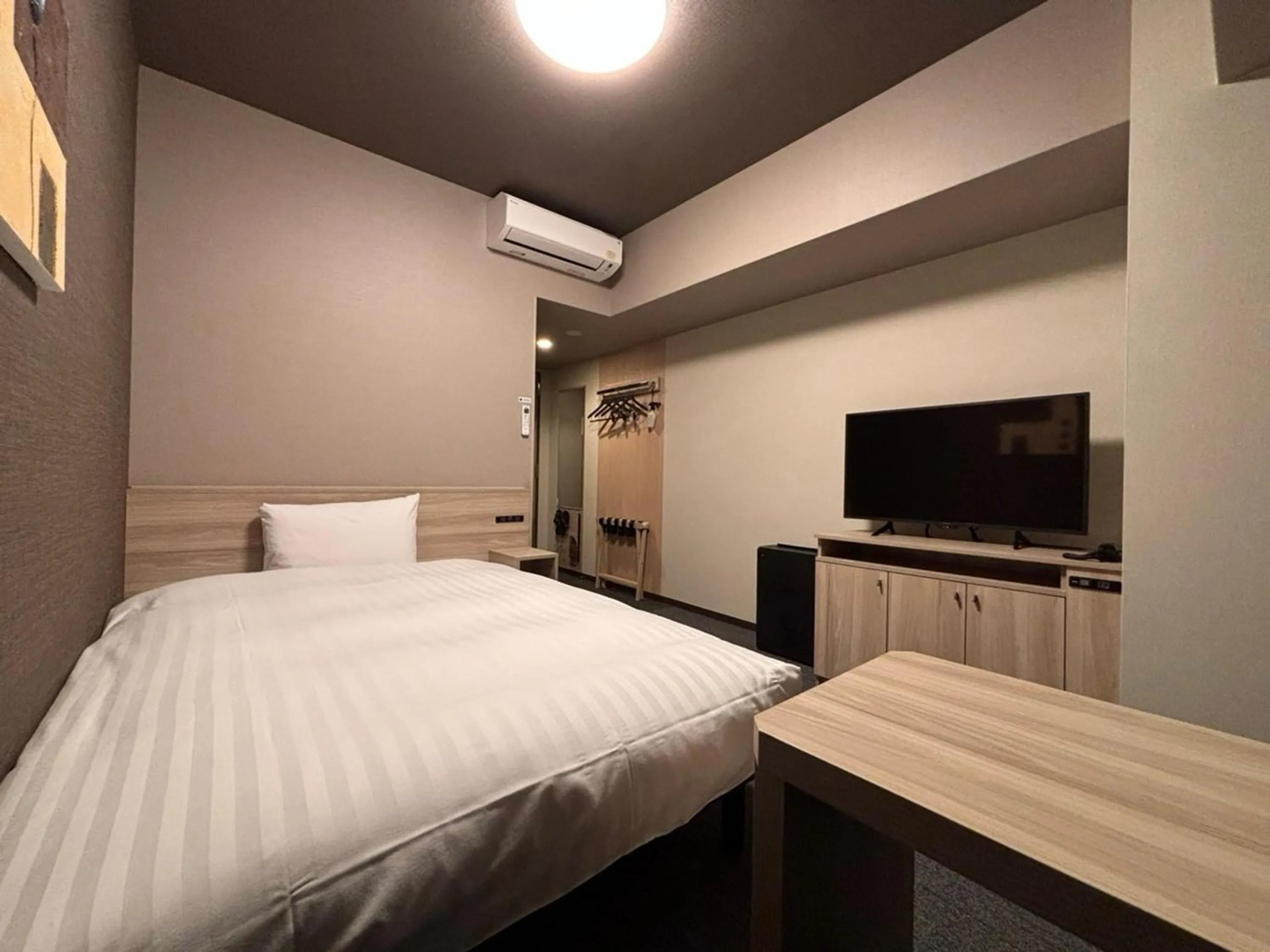 Photo of the whole room, Bed in Hotel Route Inn Kyoto Kumiyama