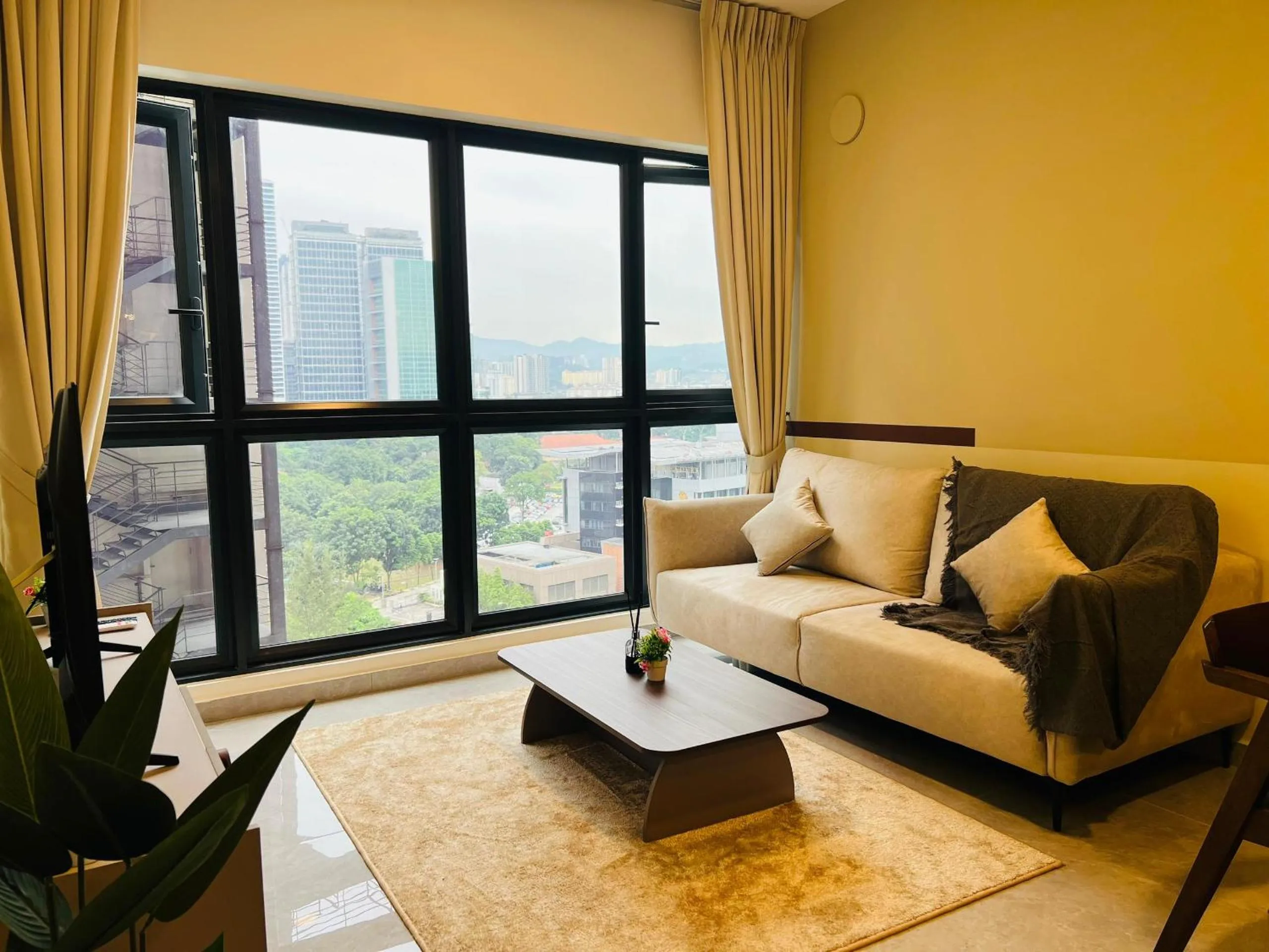 Living room in Agile Bukit Bintang by DeUrban
