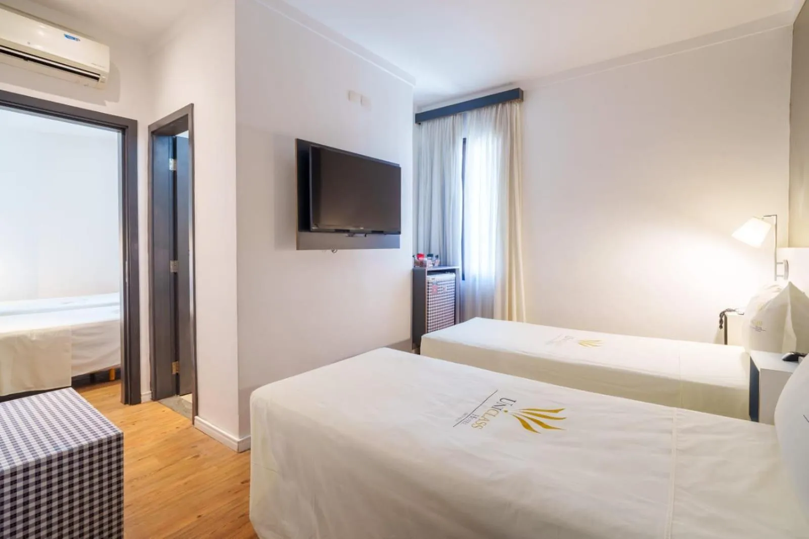 Bed in Uniclass Hotel Pinheiros