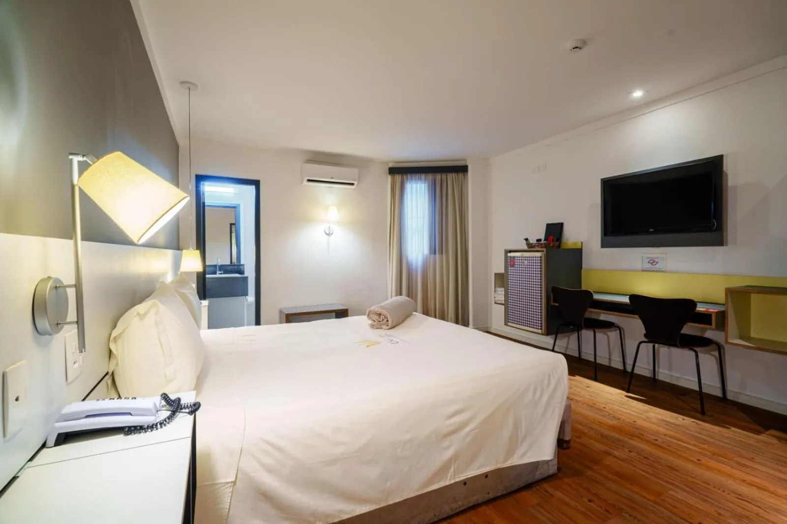 Bed in Uniclass Hotel Pinheiros