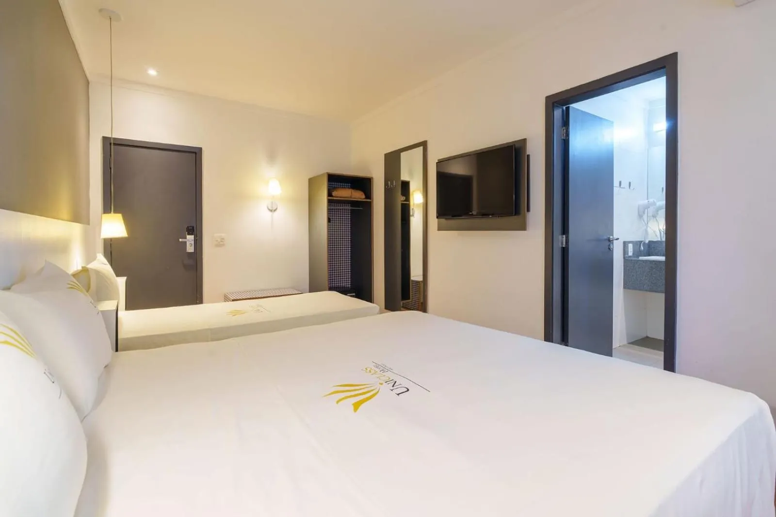 Bed in Uniclass Hotel Pinheiros