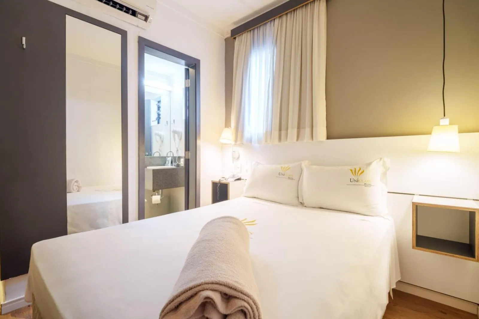 Bed in Uniclass Hotel Pinheiros