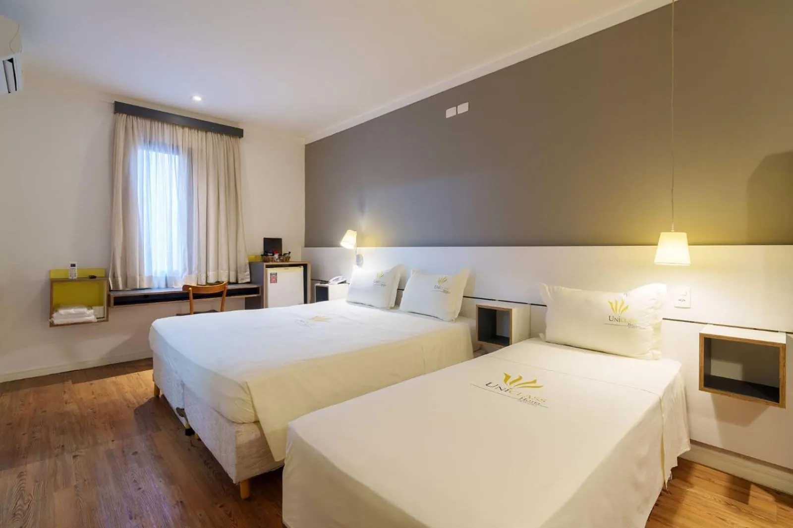 Bed in Uniclass Hotel Pinheiros