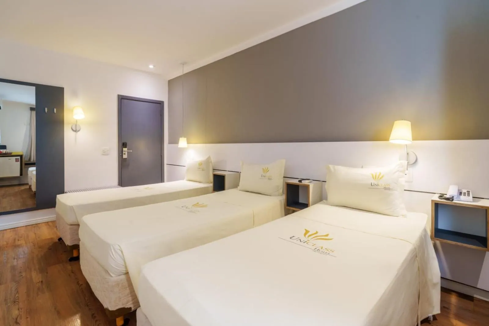 Bed in Uniclass Hotel Pinheiros