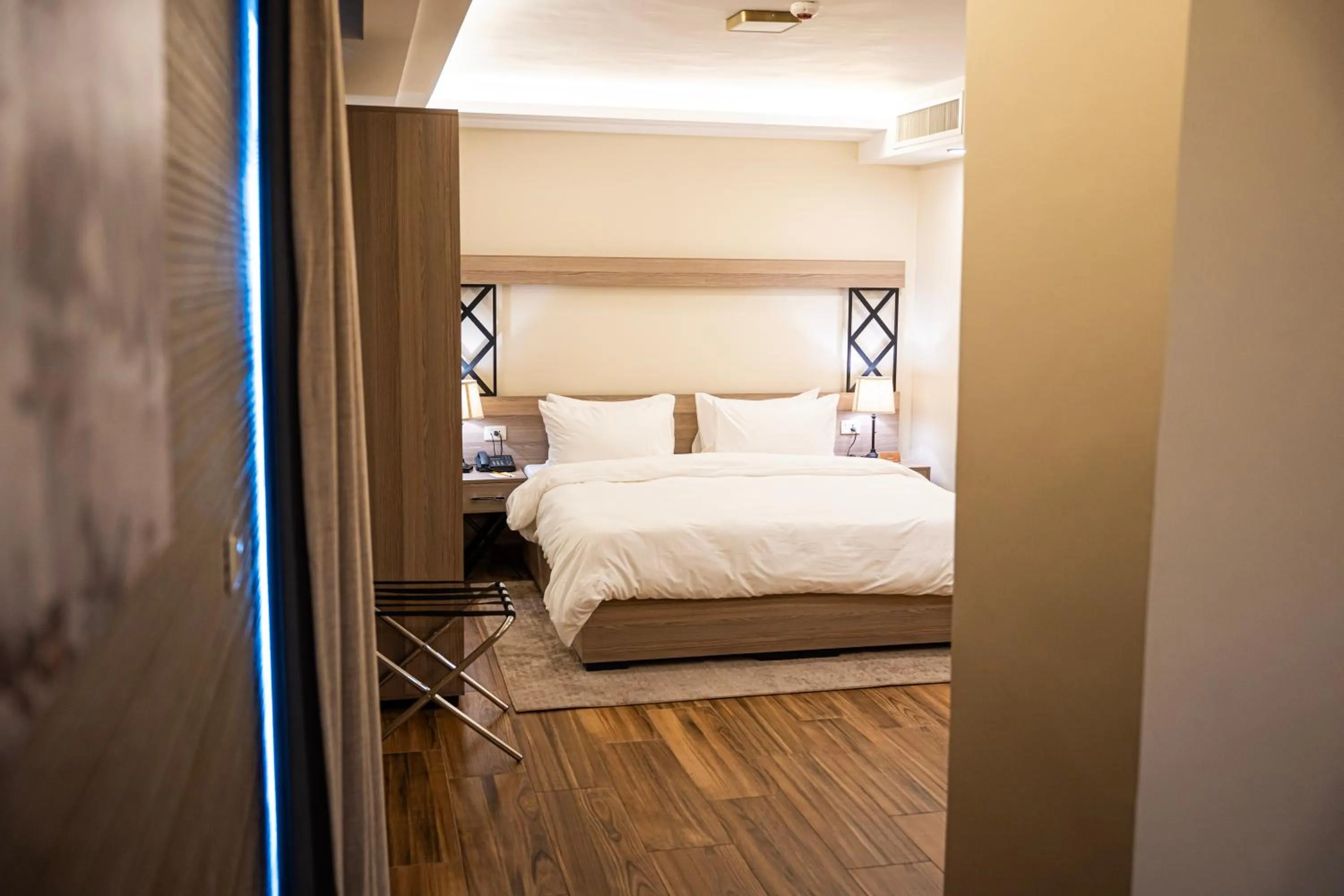 Bed in Sukoon Hotel Amman