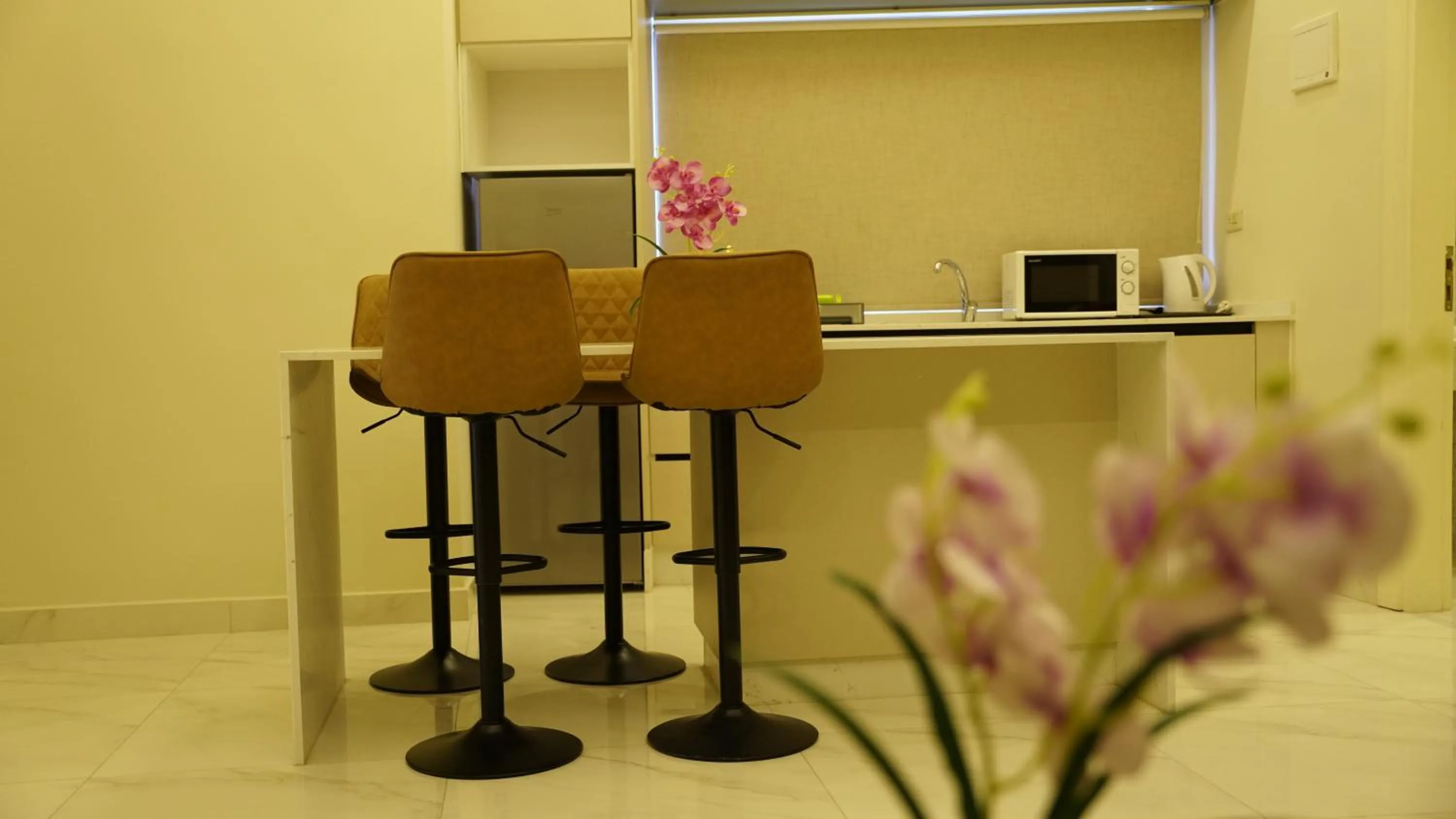 Kitchen or kitchenette in Sukoon Hotel Amman