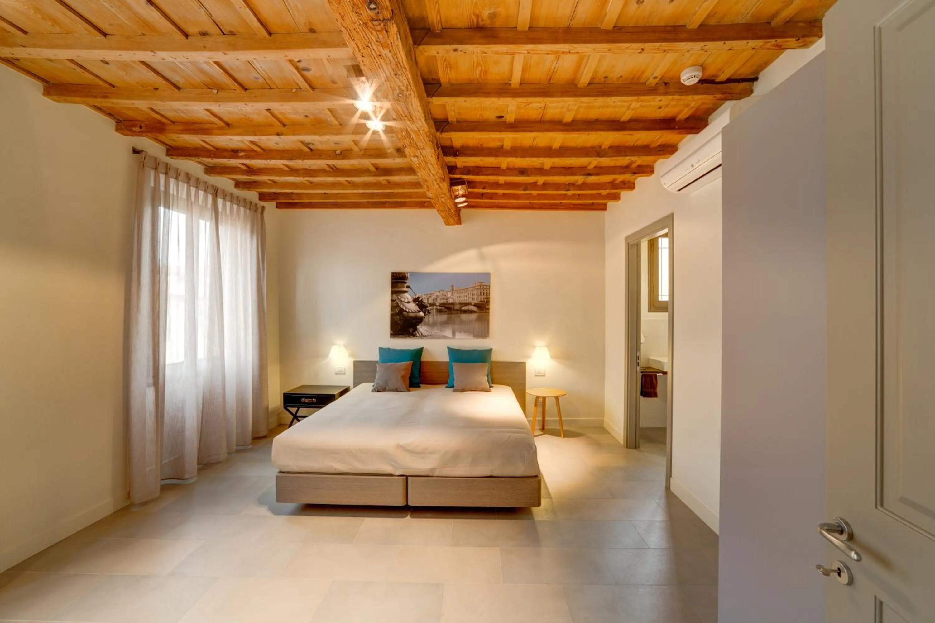 Bed in Palazzo Mannaioni Suites