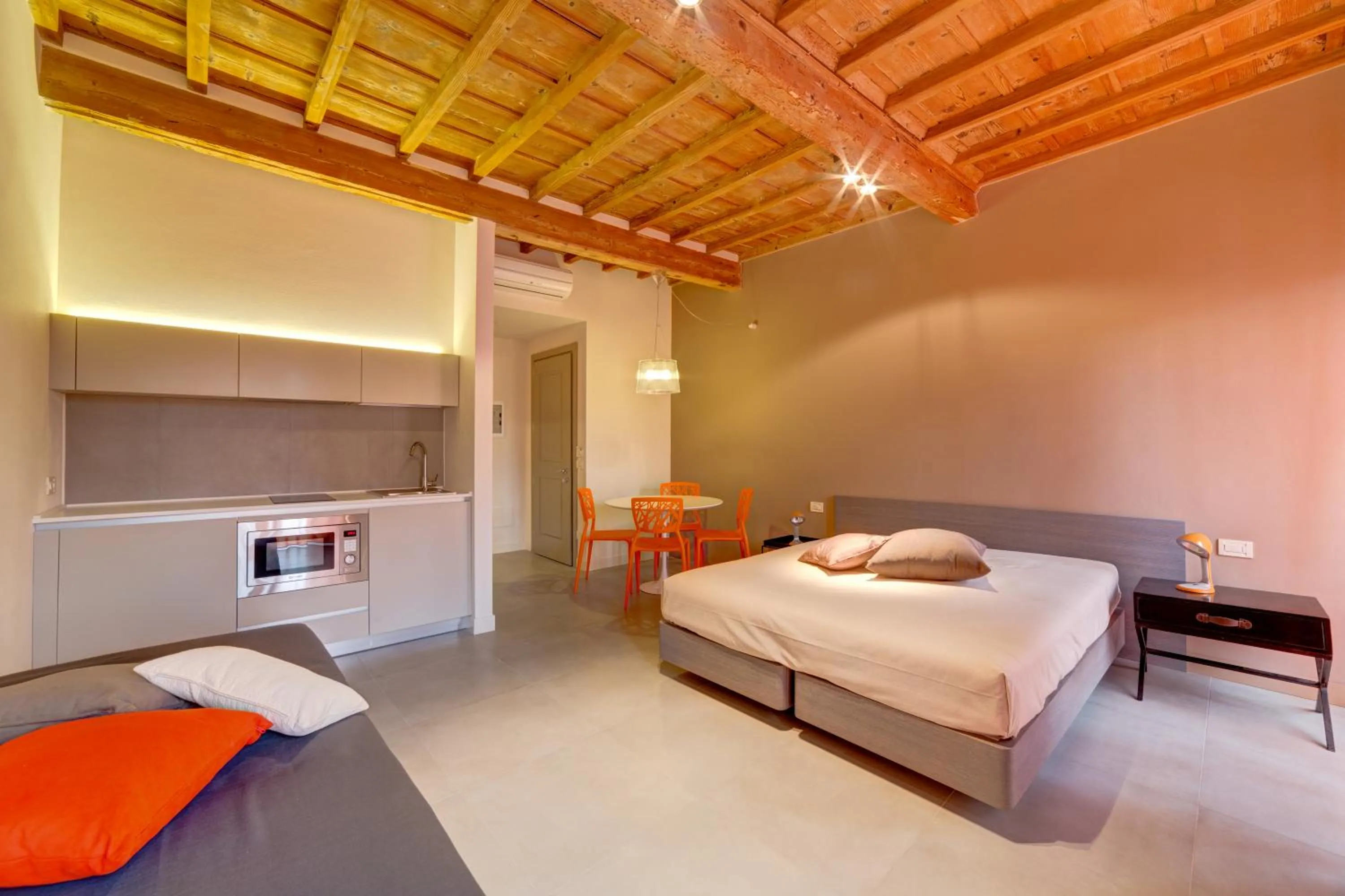 Bed in Palazzo Mannaioni Suites