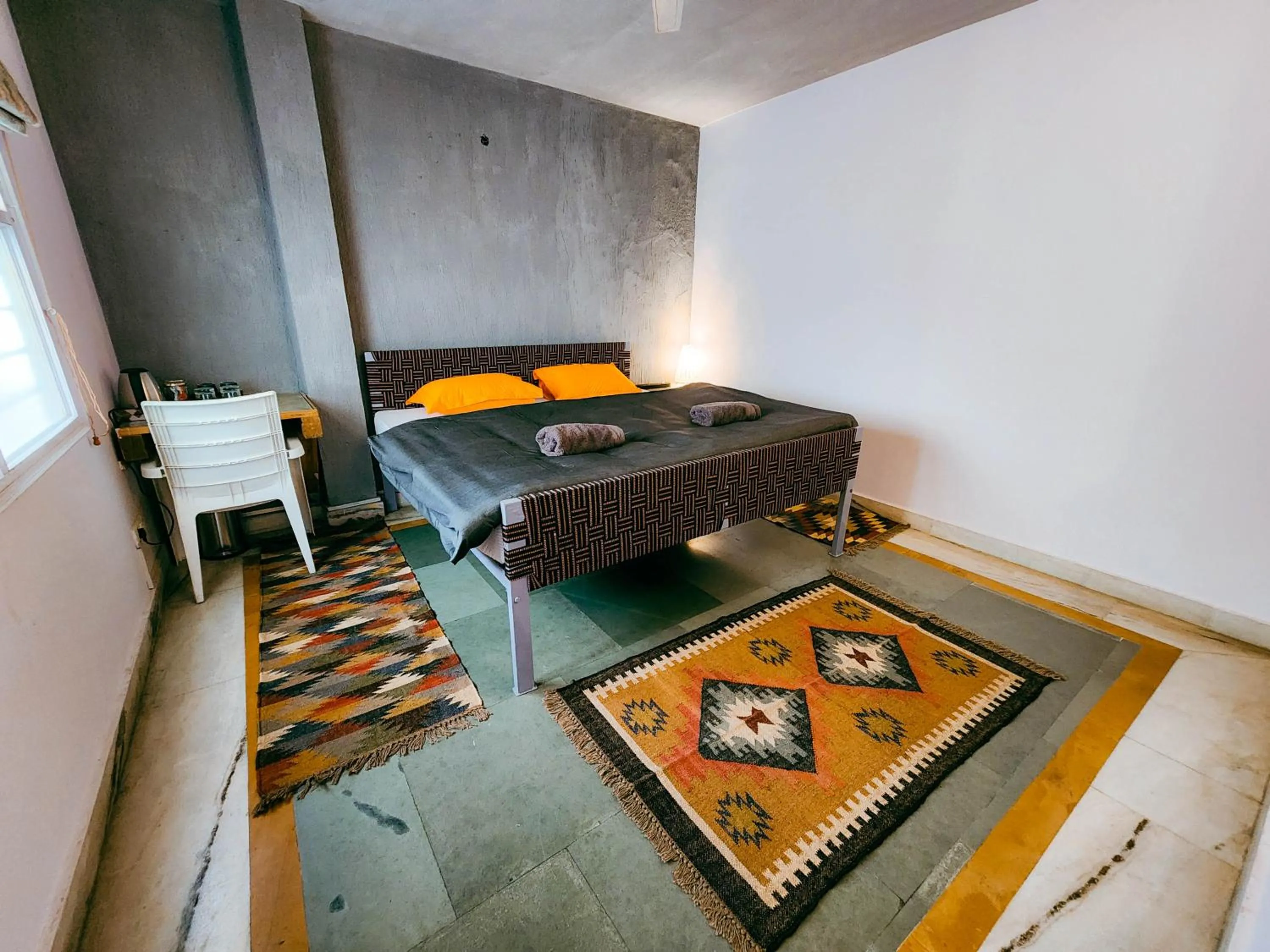 Bed in JHouse near Bhikaji