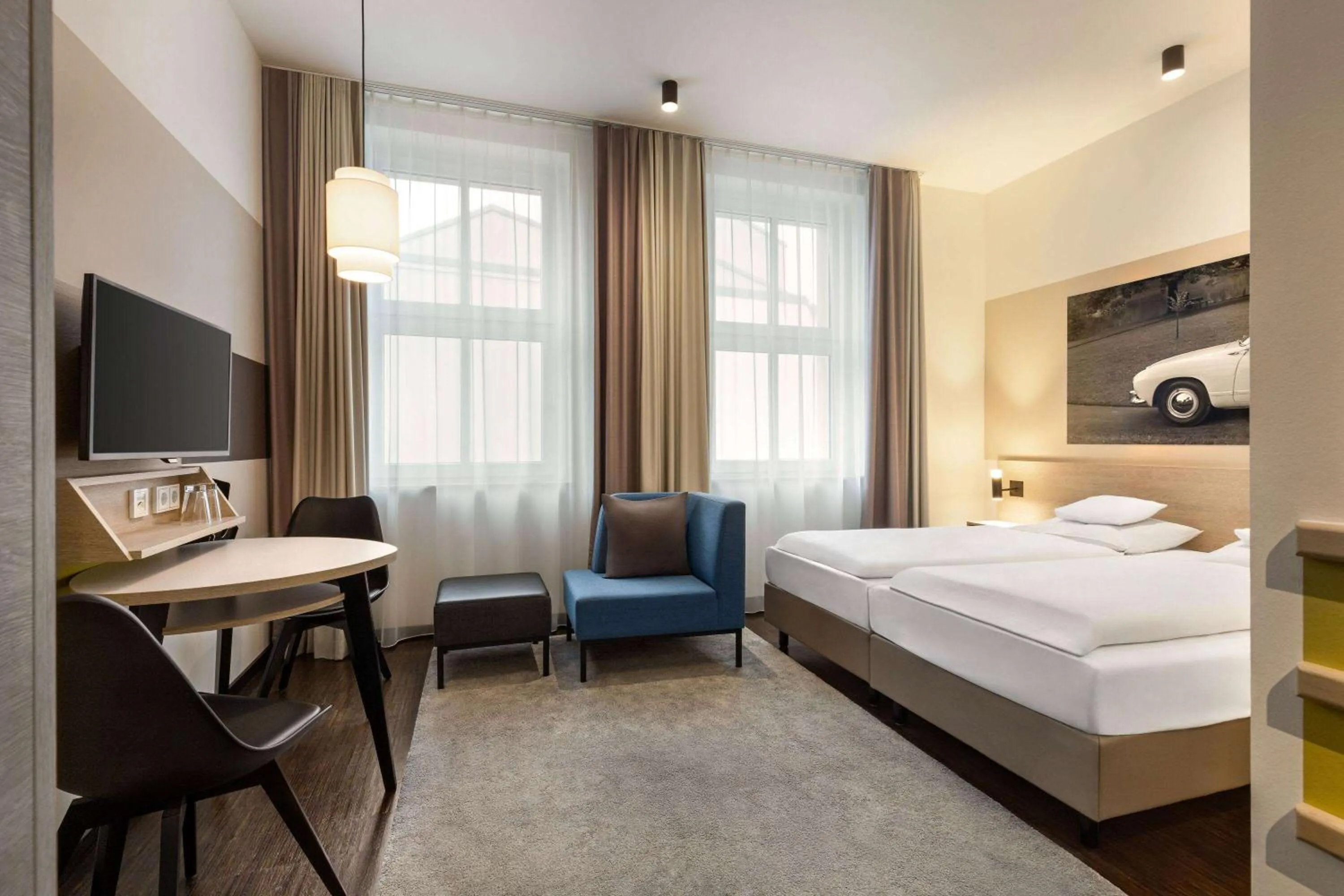 Bed in Vienna House Easy by Wyndham Osnabrück City & Apartments