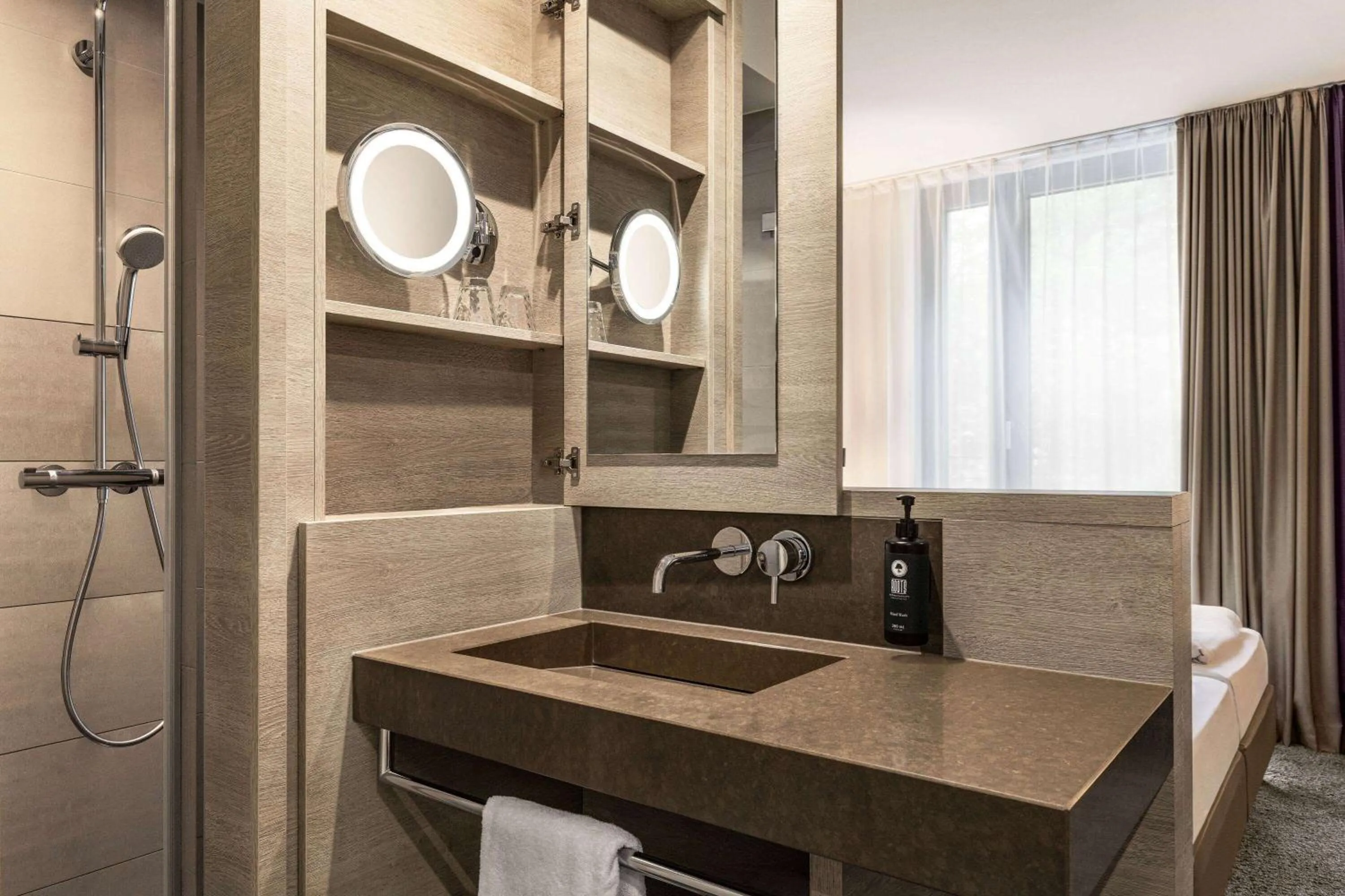 Shower in Vienna House Easy by Wyndham Osnabrück City & Apartments