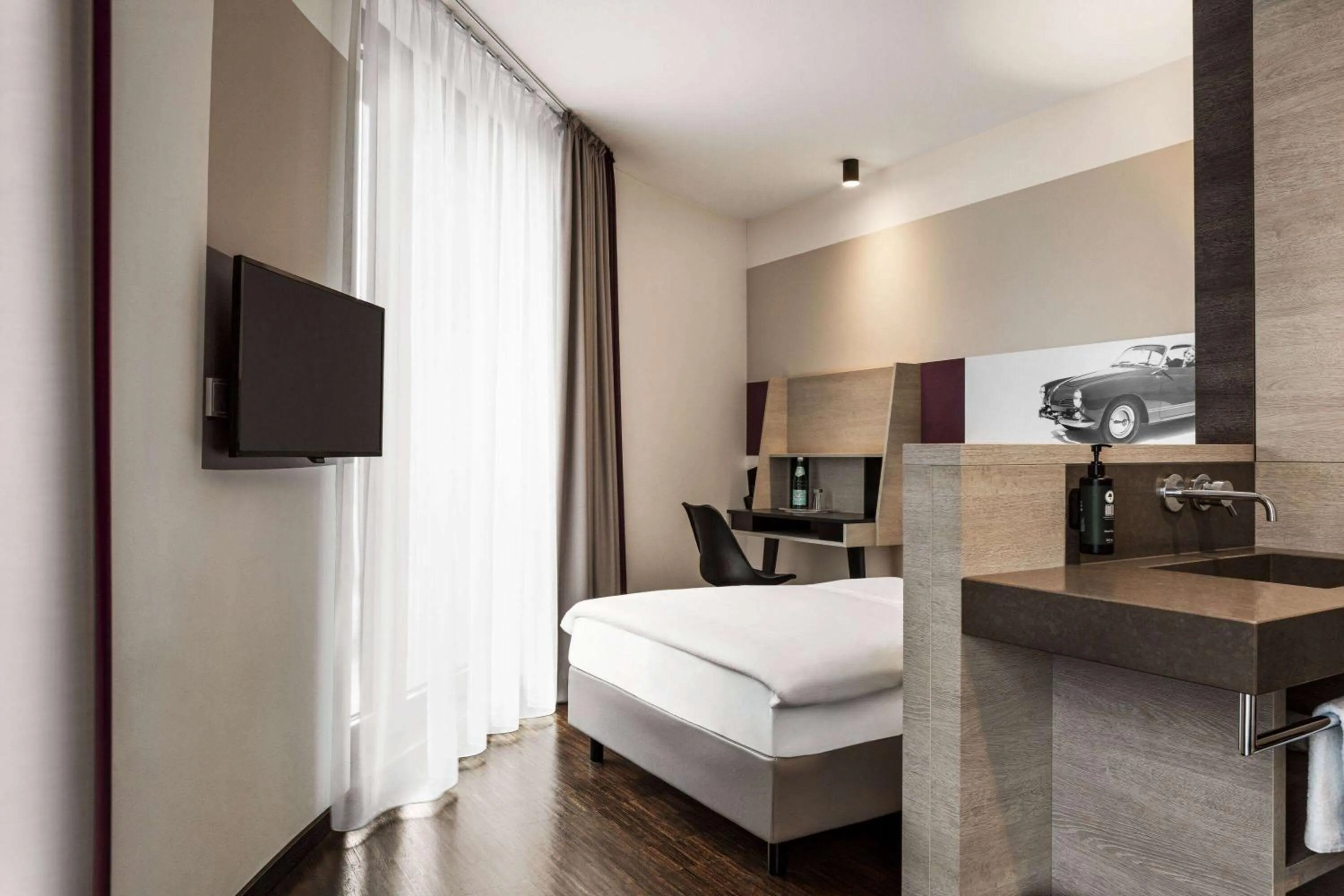 Bed in Vienna House Easy by Wyndham Osnabrück City & Apartments