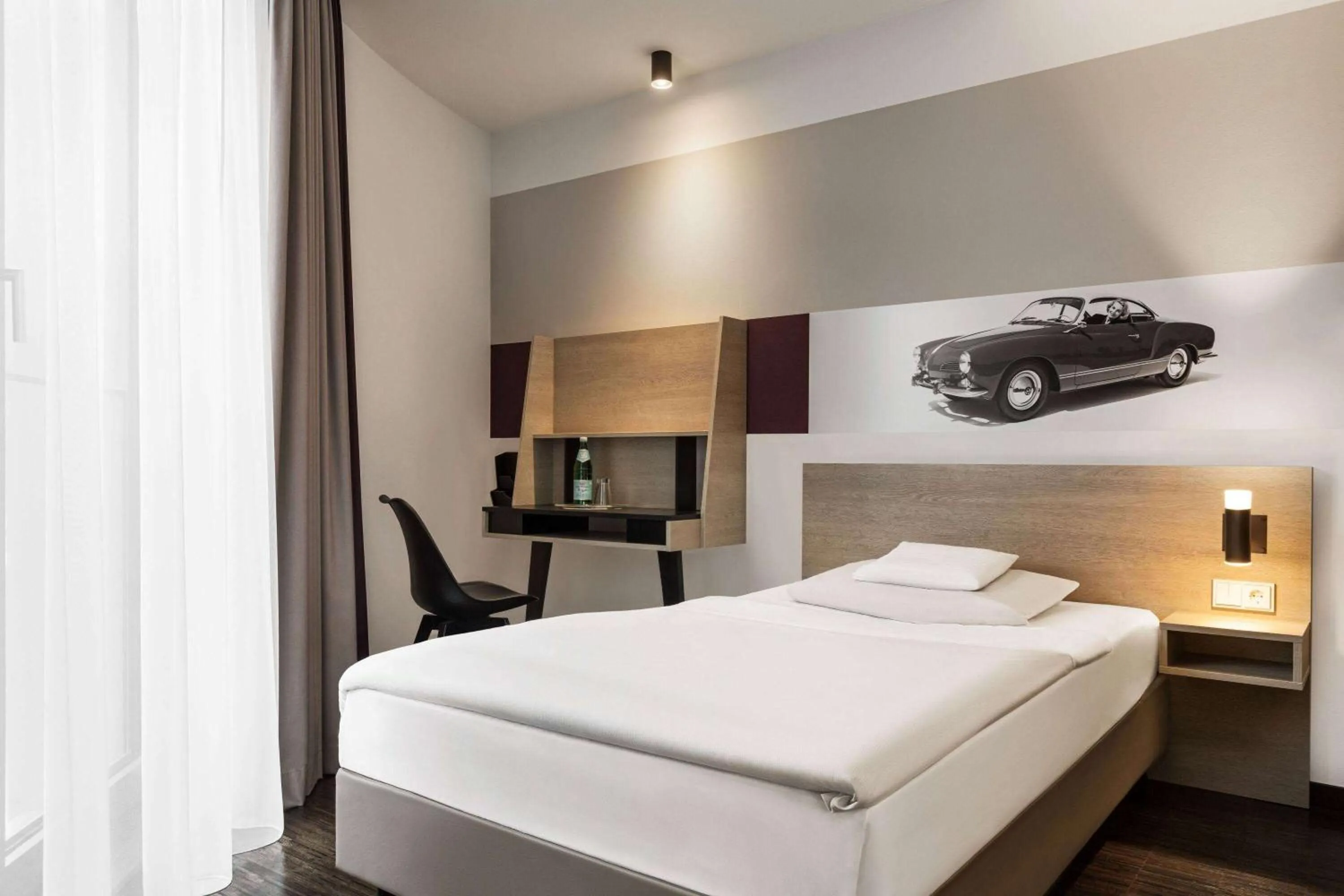 Bed in Vienna House Easy by Wyndham Osnabrück City & Apartments