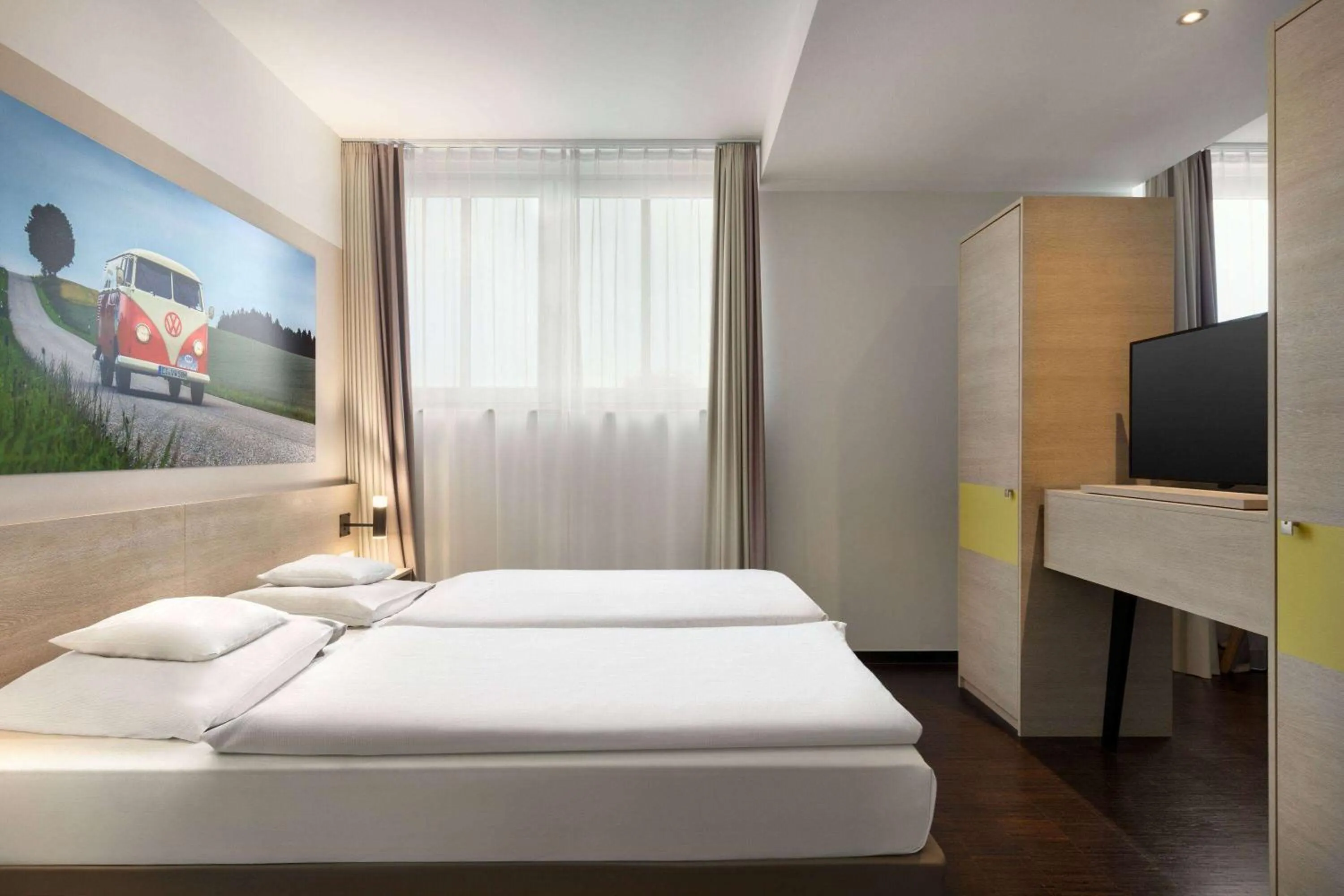 Bed in Vienna House Easy by Wyndham Osnabrück City & Apartments