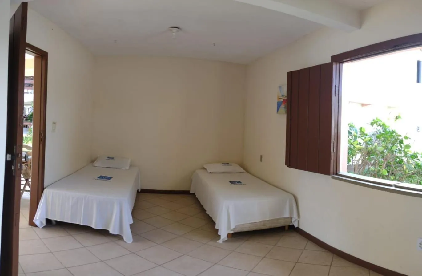 Bed in Pousada Aldeia Mar