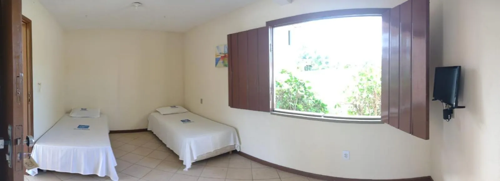 Bed in Pousada Aldeia Mar