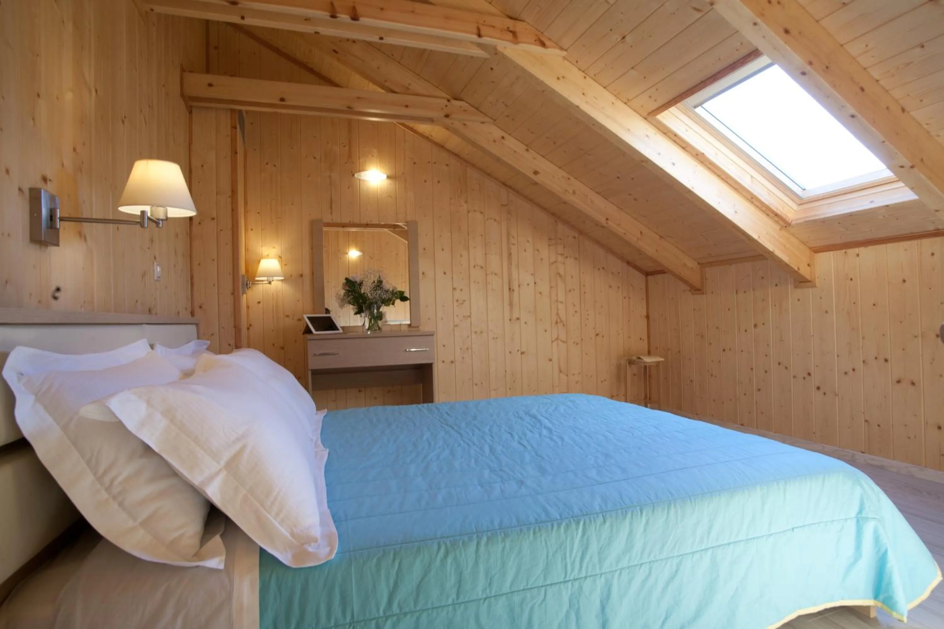 Bed in Grand TheoNi Boutique Hotel & Spa