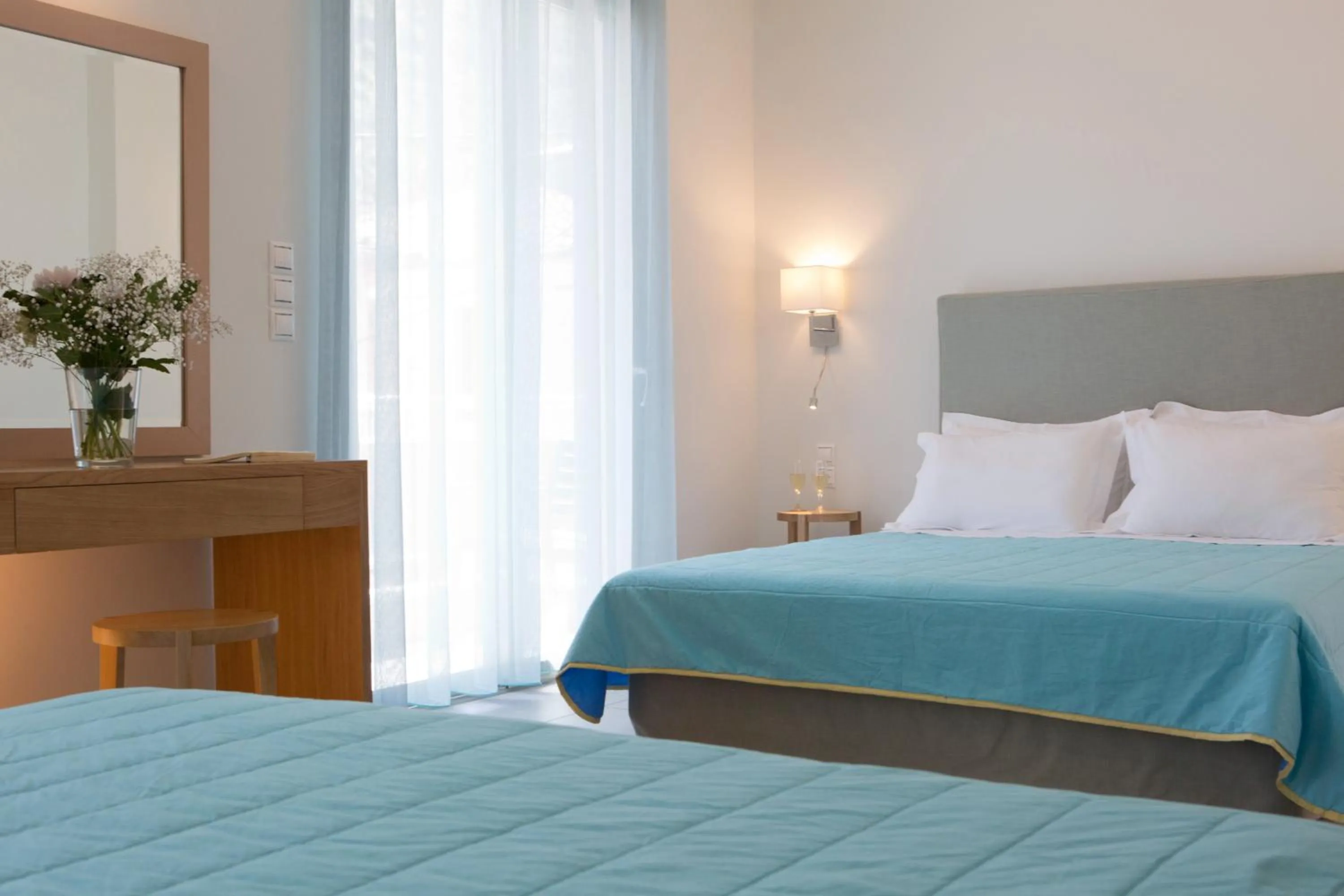 Bed in Grand TheoNi Boutique Hotel & Spa